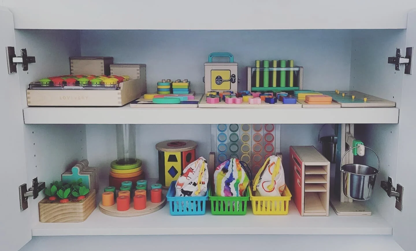 #prettyneat little kid's cubby 🧡💛💚💙