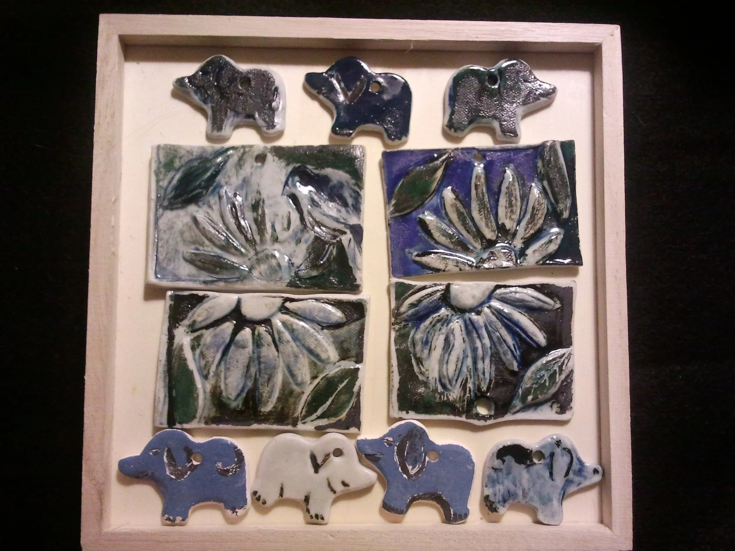 "Daisies and elephants" 2000’s, Ceramic tiles for the top of a box
