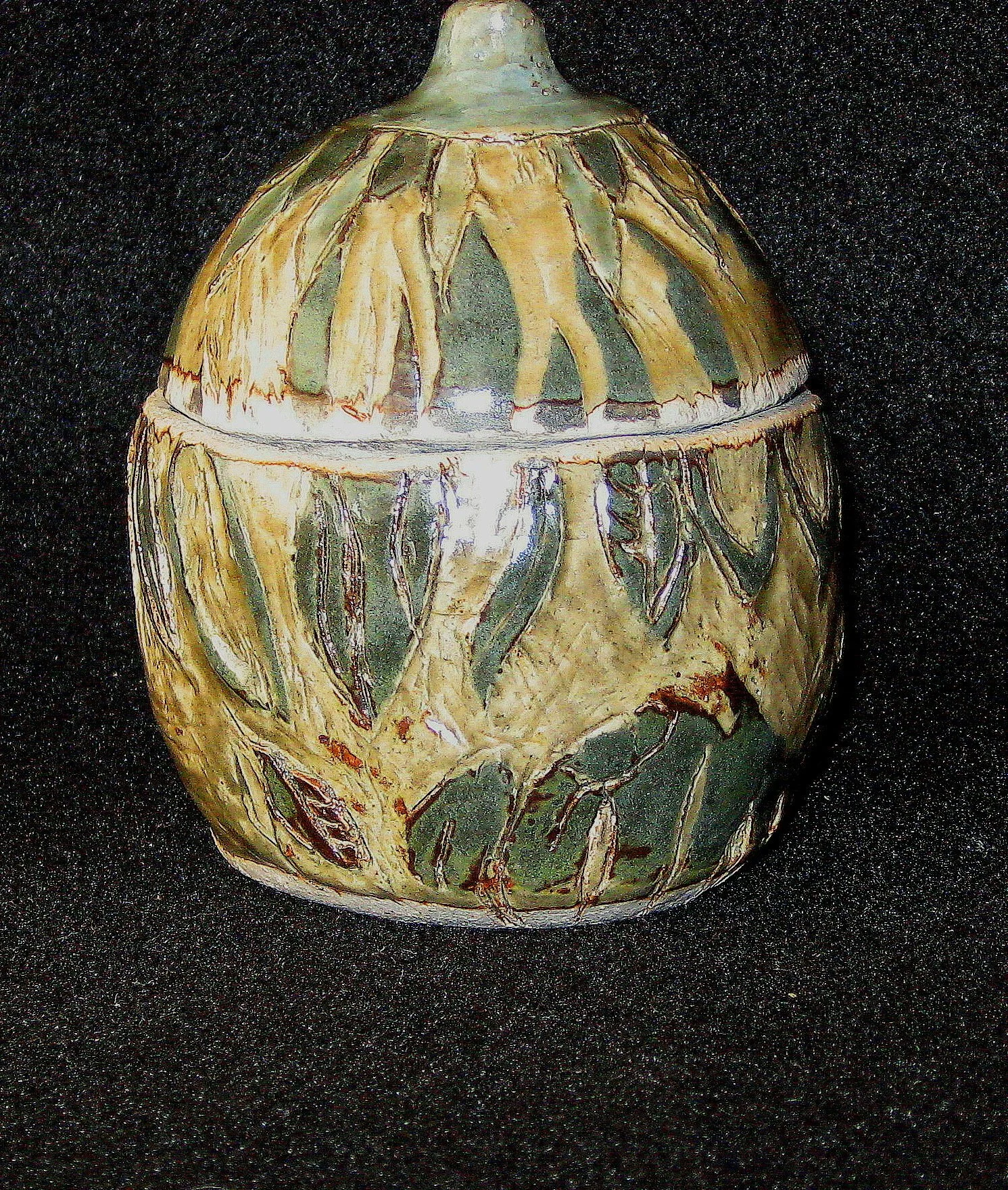 "Green Leaf Jar" 2010, Ceramic, stoneware hand carved
