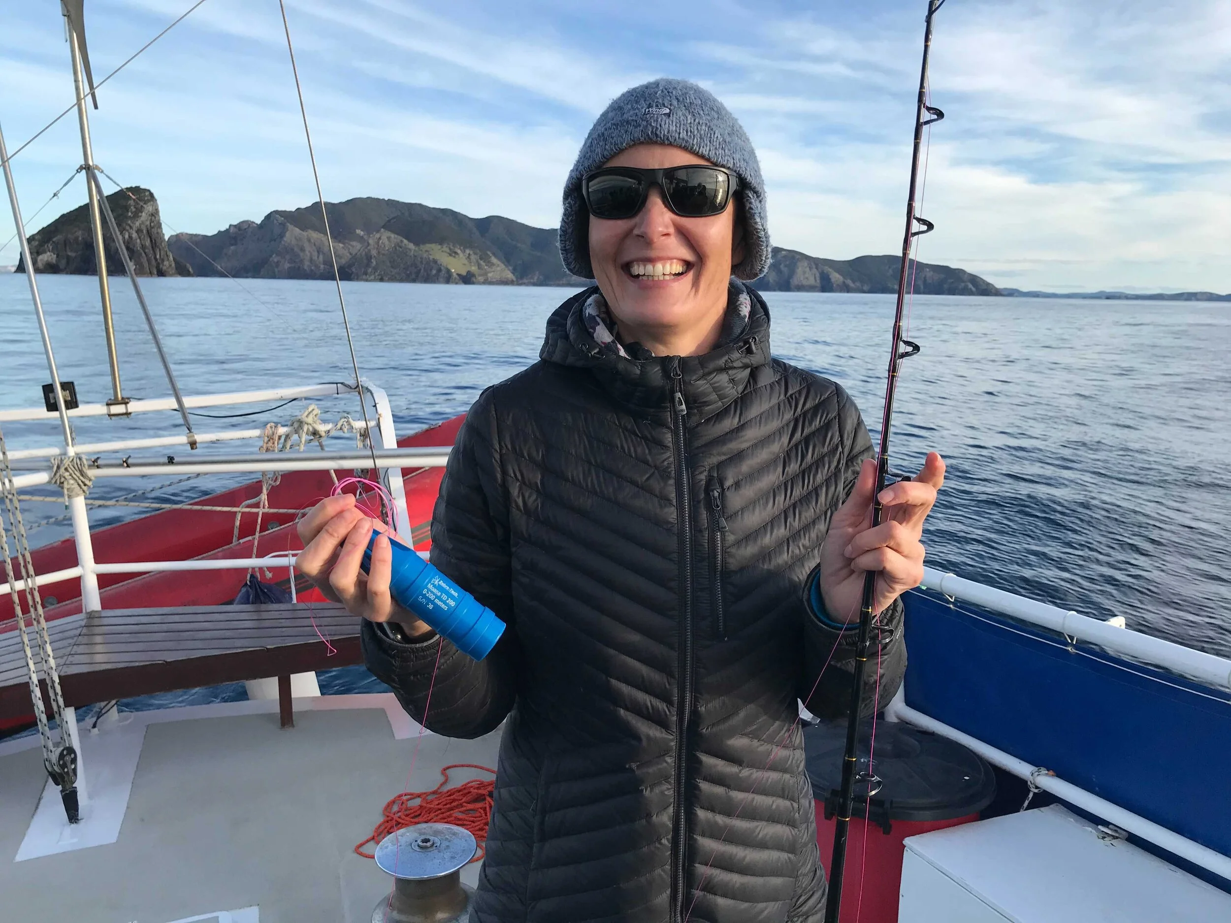 Dr Aitana Forcén-Vázquez with the Mangōpare sensor attached to a fishing rod.