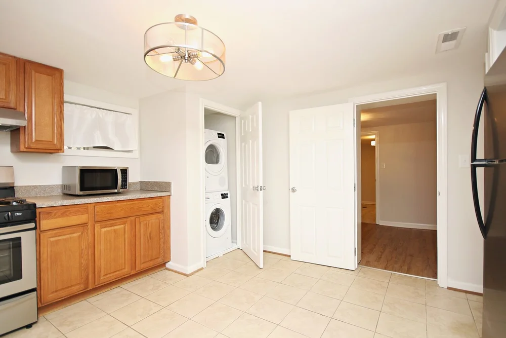 Spacious Basement Apartment With Utilities Included — Braden Property