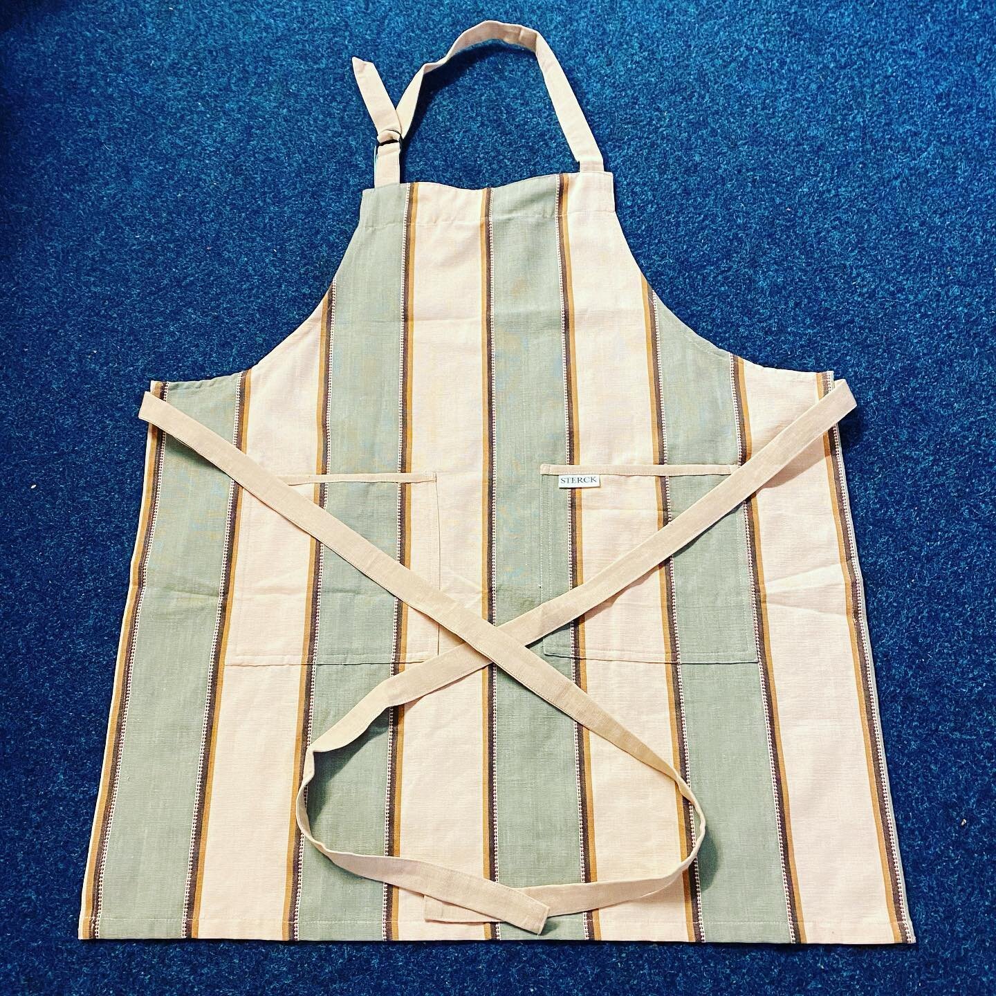 These cleverly designed aprons are made from thick cotton fabric and excellently stitched in India to fit everyone. We have a few different designs and even some for children.  #purecotton #apron #childsapron #indiancotton