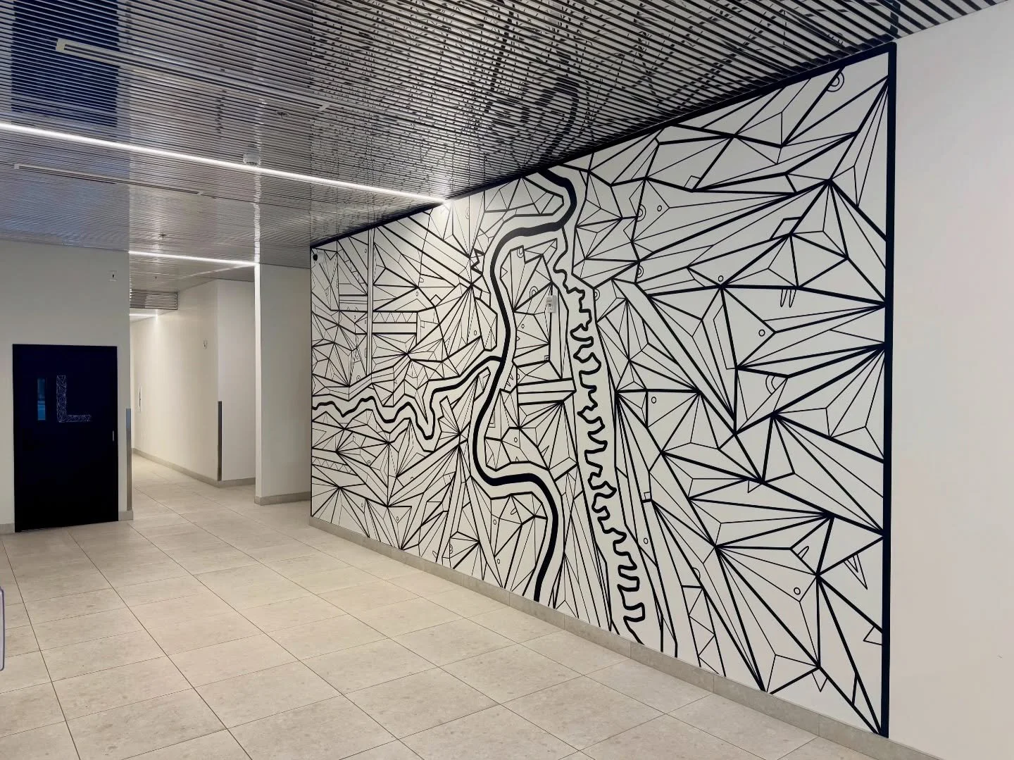 Super pleased to have partnered with Concord Projects and @atlrgarch Inc. in Winnipeg, Manitoba on this new geometric downtown cityscape condo piece. The 12-foot-high by 25-foot-wide installation sits in the front lobby and reflects the city&rsquo;s 