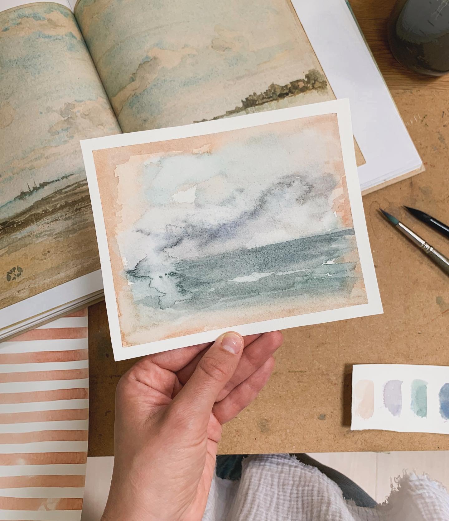 In the studio today: a master copy of a Whistler watercolor. The bleed is everything. The muted colors. The way he abstracts and simplifies yet keeps it so full of life. Glorious. (also some hints at May&rsquo;s painting 🏖️)
.
#artistsofinstagram #w