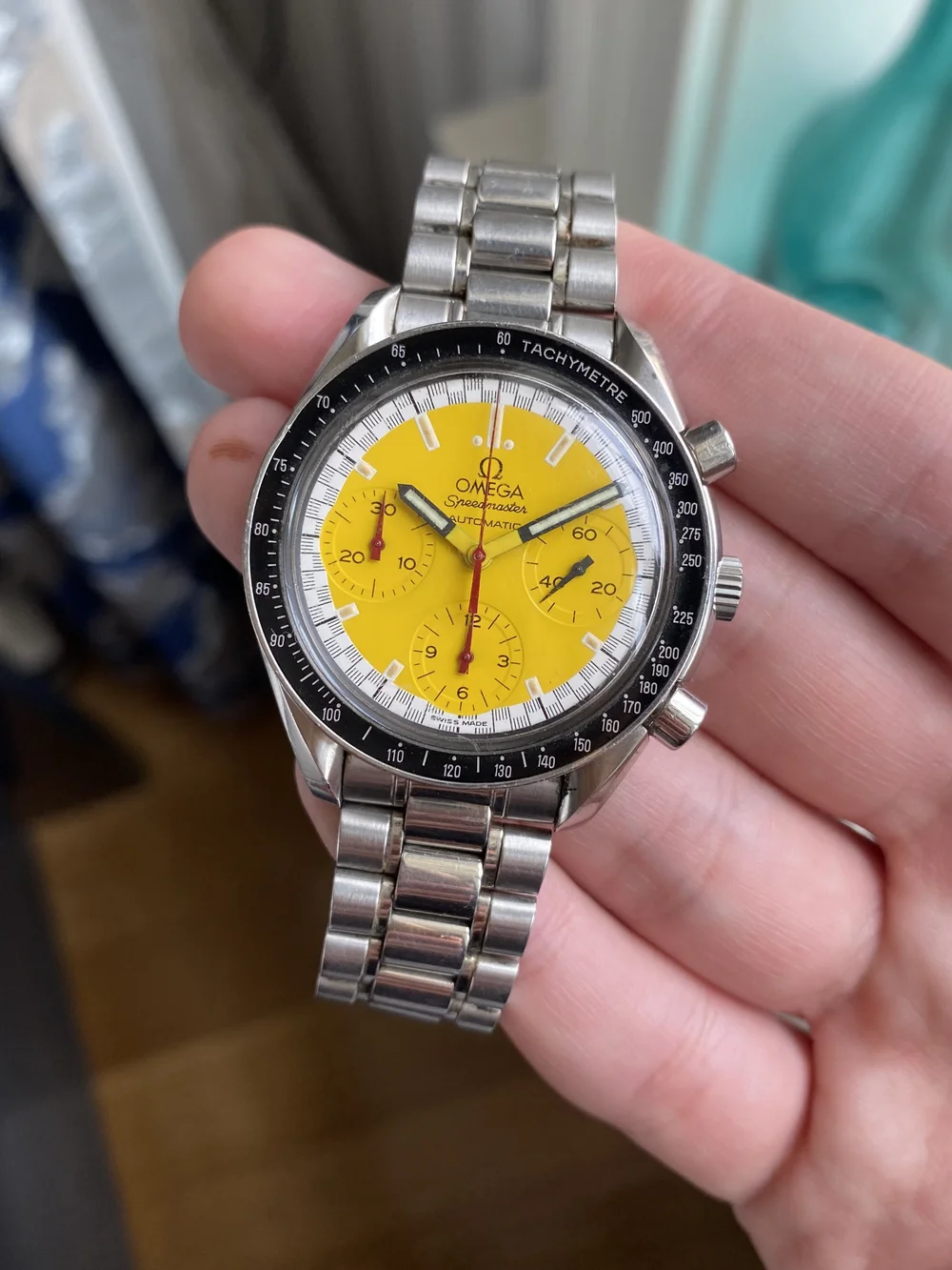 omega speedmaster schumacher yellow