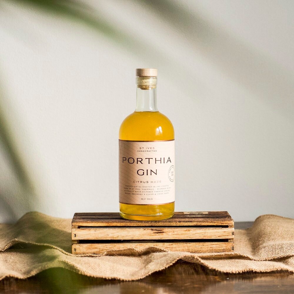 Porthia Gin is crafted in the heart of St Ives. Using their wonderfully crisp Cornish Dry Gin as a base, the Citrus Haze expression is infused with 100% real orange peels and a touch of subtle lime. The result is a punchy orange-forward gin that's im