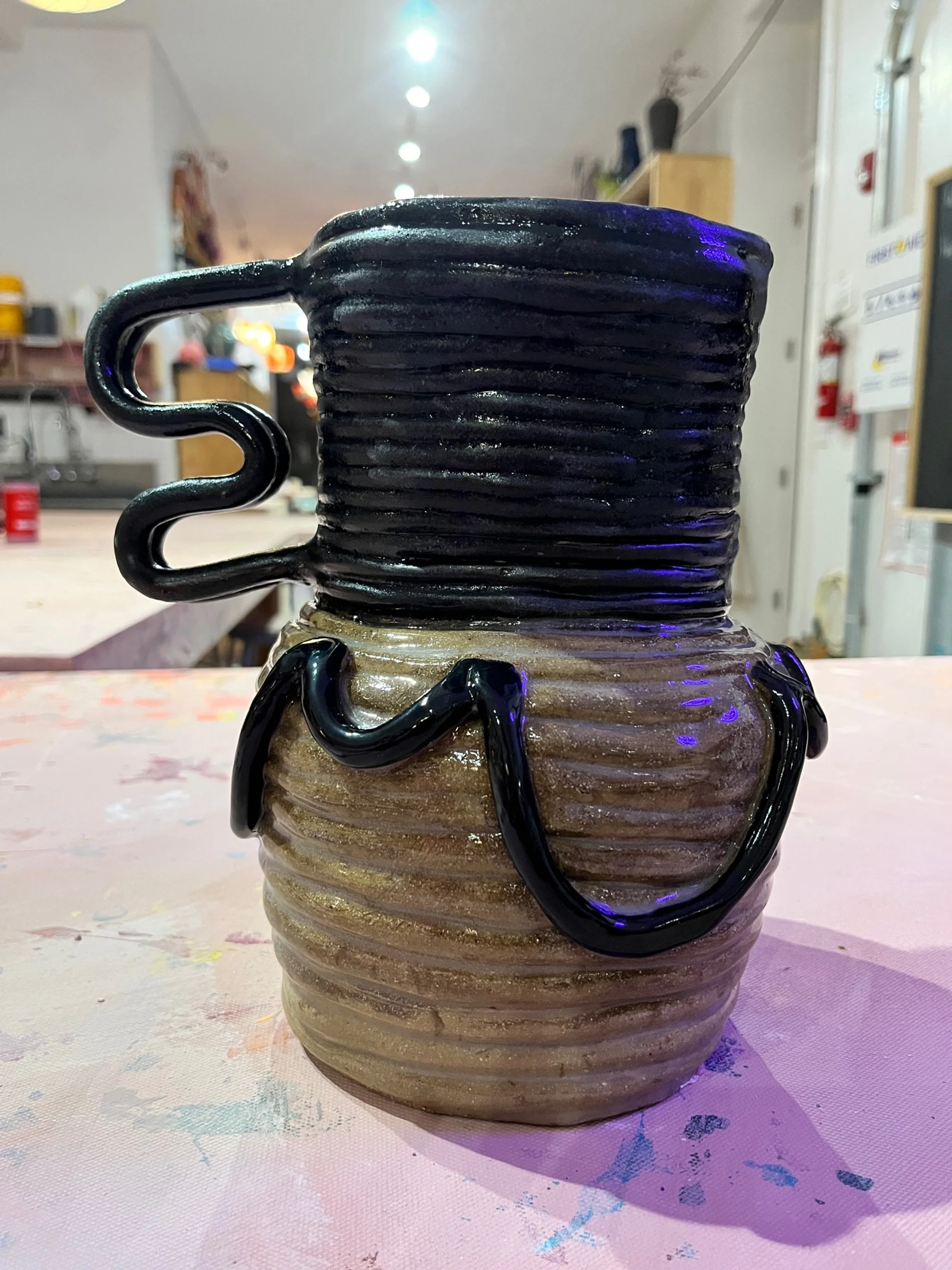 vase with curvy handle, recycled studio clay, 9inx8in, 2024.JPG