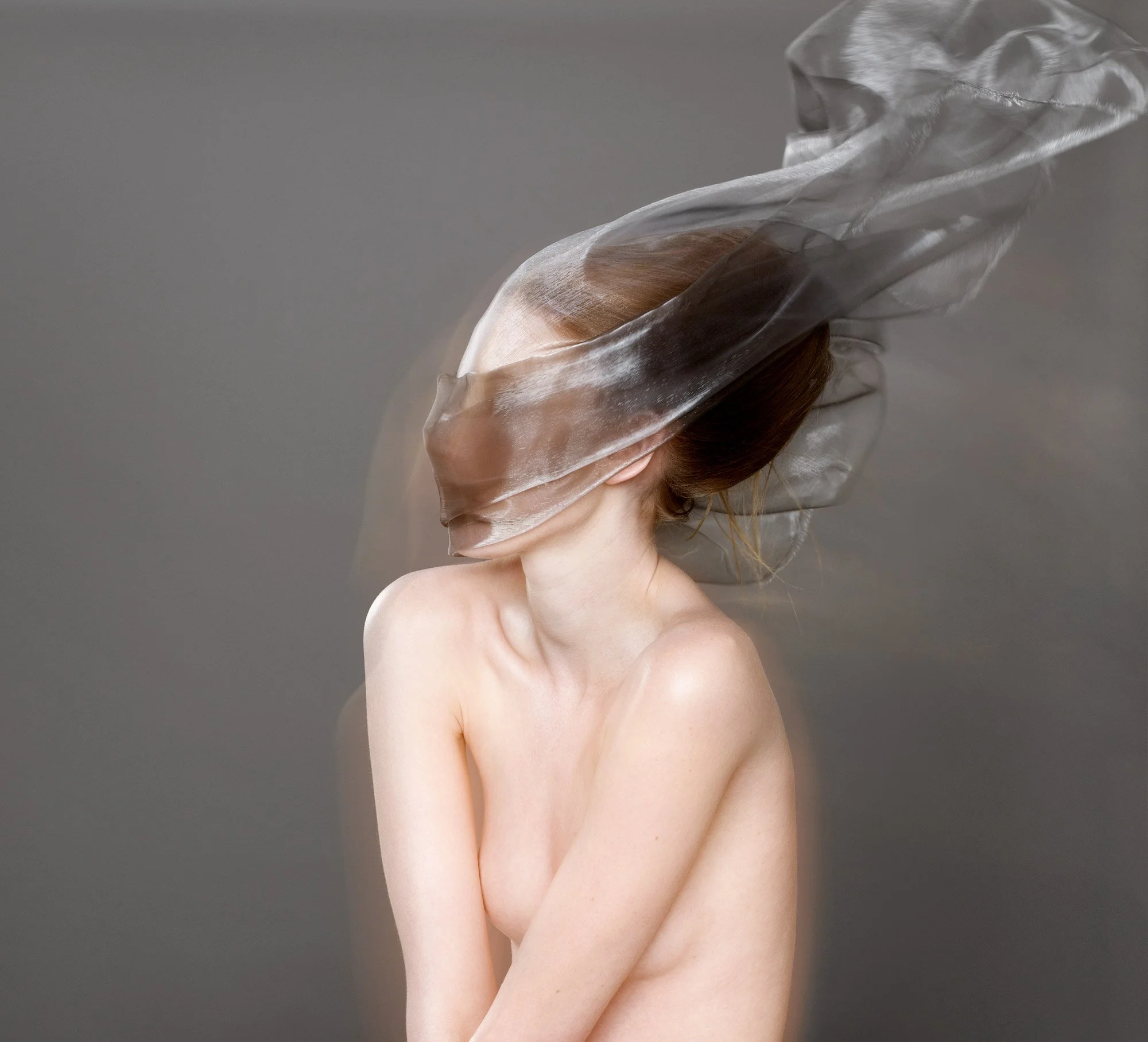 A series of photographs of Sydney models experimenting with the use of translucent fabric by photographer David.A.Knight