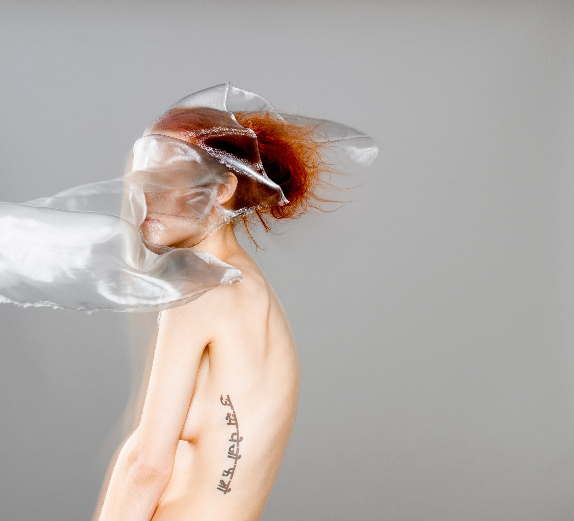 A series of photographs of Sydney models experimenting with the use of translucent fabric by photographer David.A.Knight