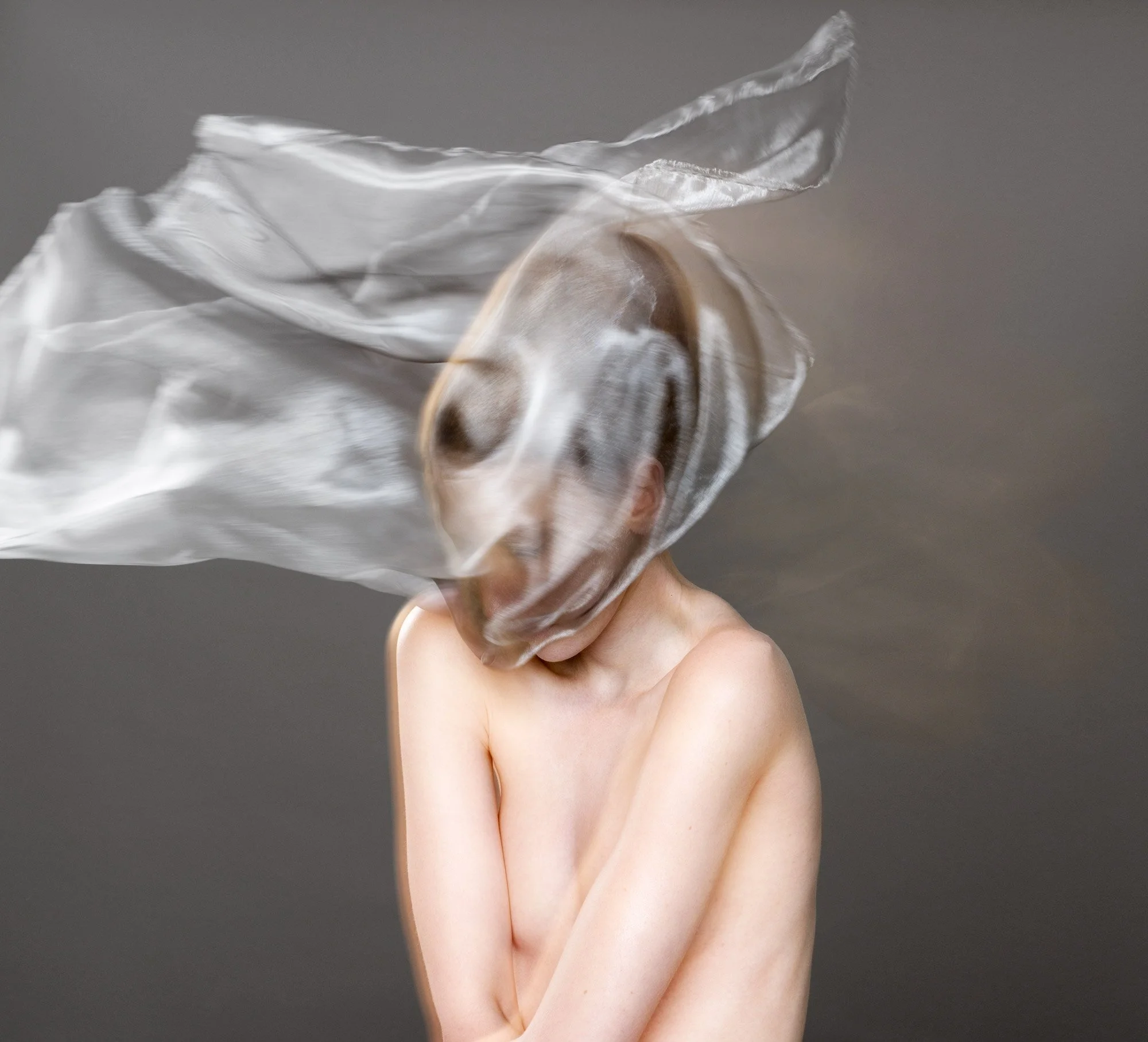 A series of photographs of Sydney models experimenting with the use of translucent fabric by photographer David.A.Knight