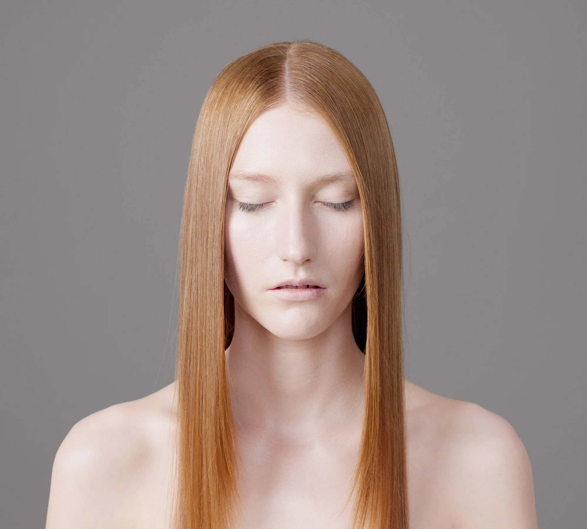 Studio portrait of Lauren with straight hair and eyes closed shut from the series 'Curiosity' by photographer David.A.Knight ©