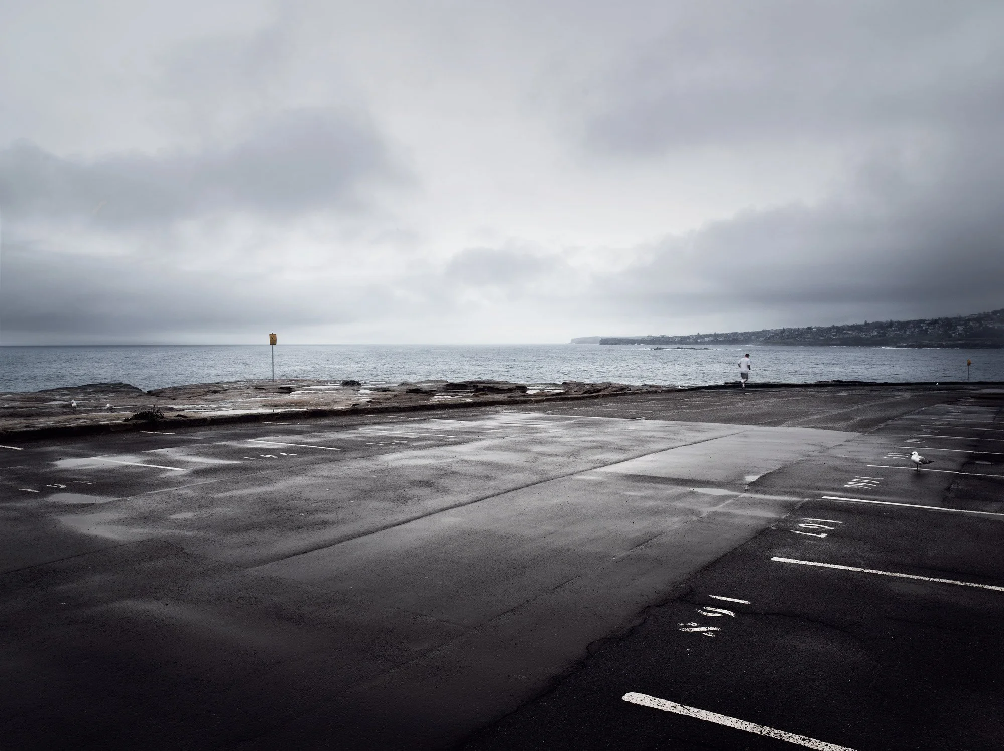 Landscape photograph of a solitary runner at Clovelly by Sydney photographer David.A.Knight ©. The image was a finalist at The Moran Contemporary Photography Prize.