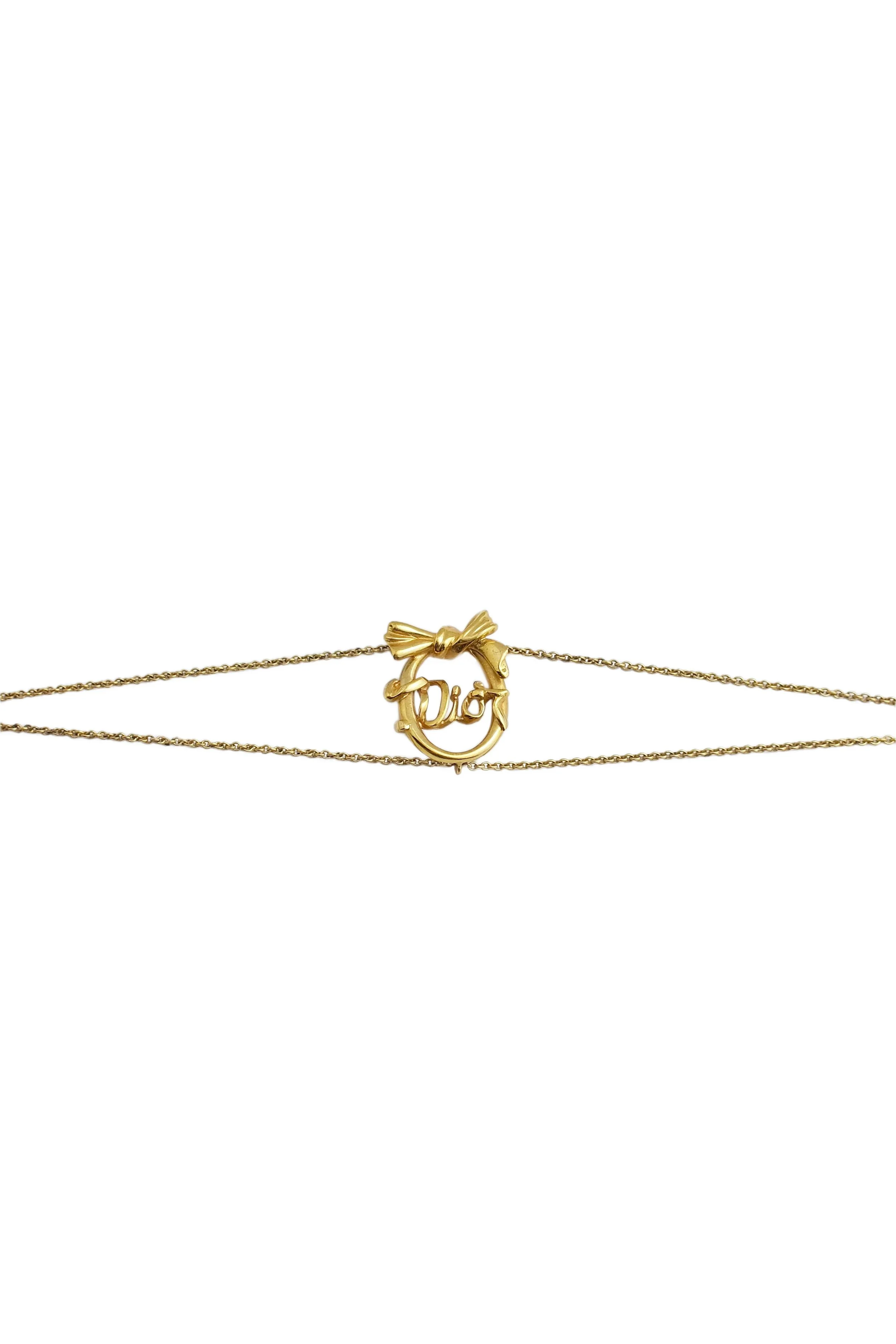 dior bow circle pendant bracelet wbg.jpg