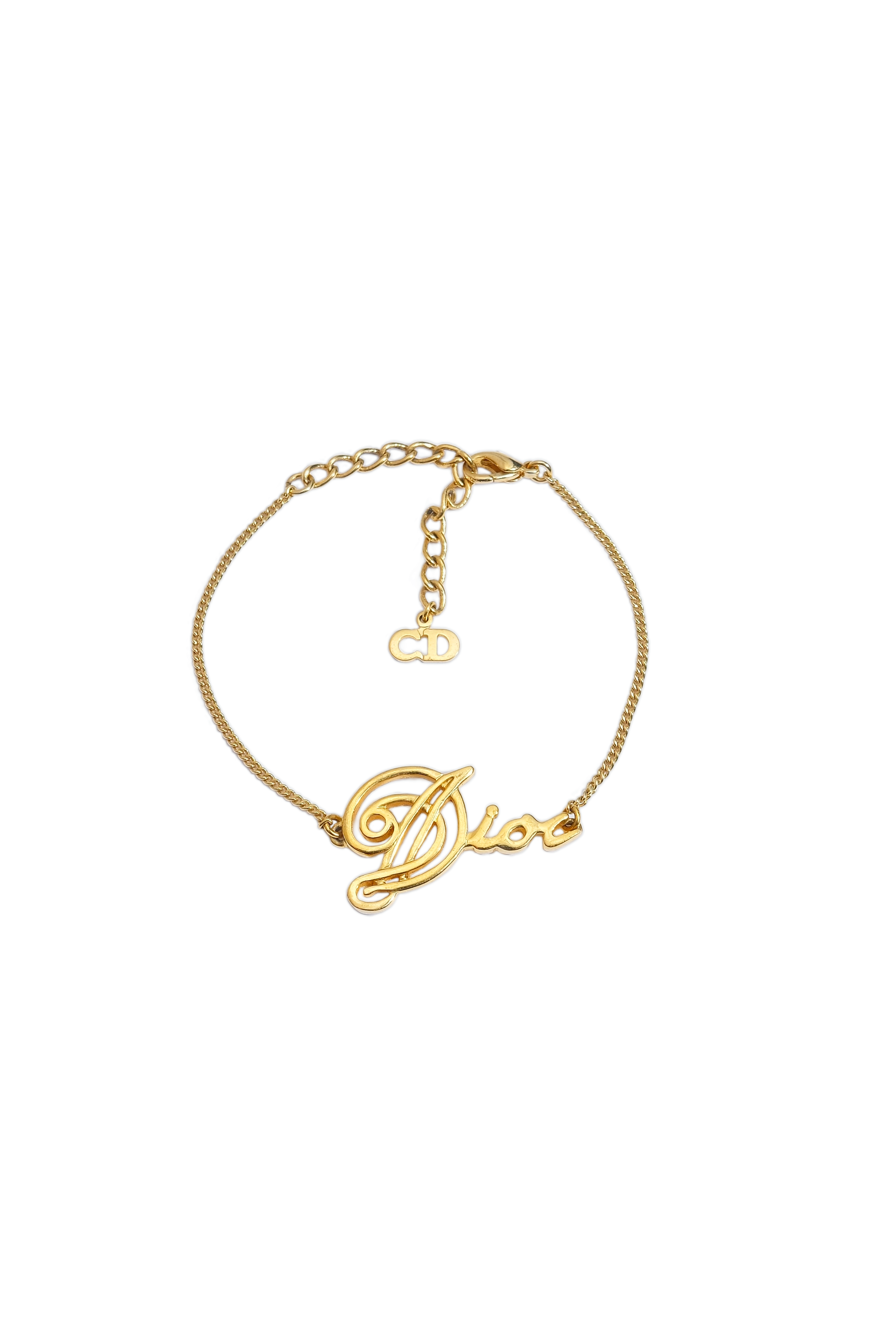 dior cursive spellout bracelet wbg.png