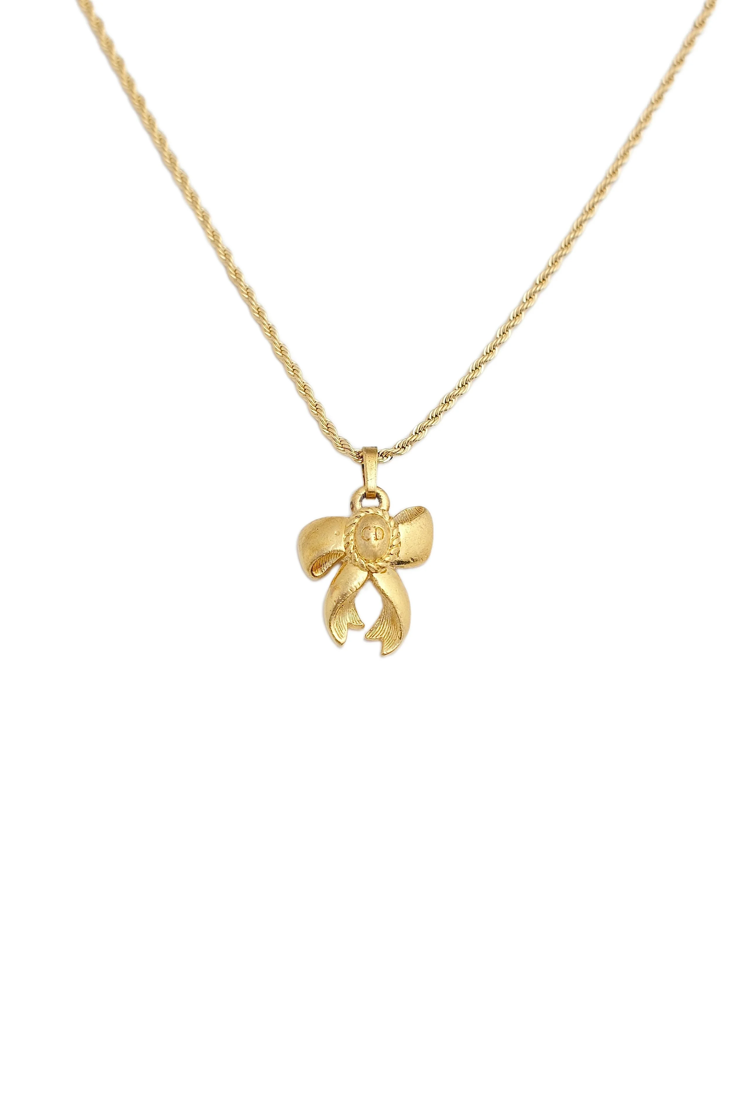 dior gold cd bow necklace wbg.jpg