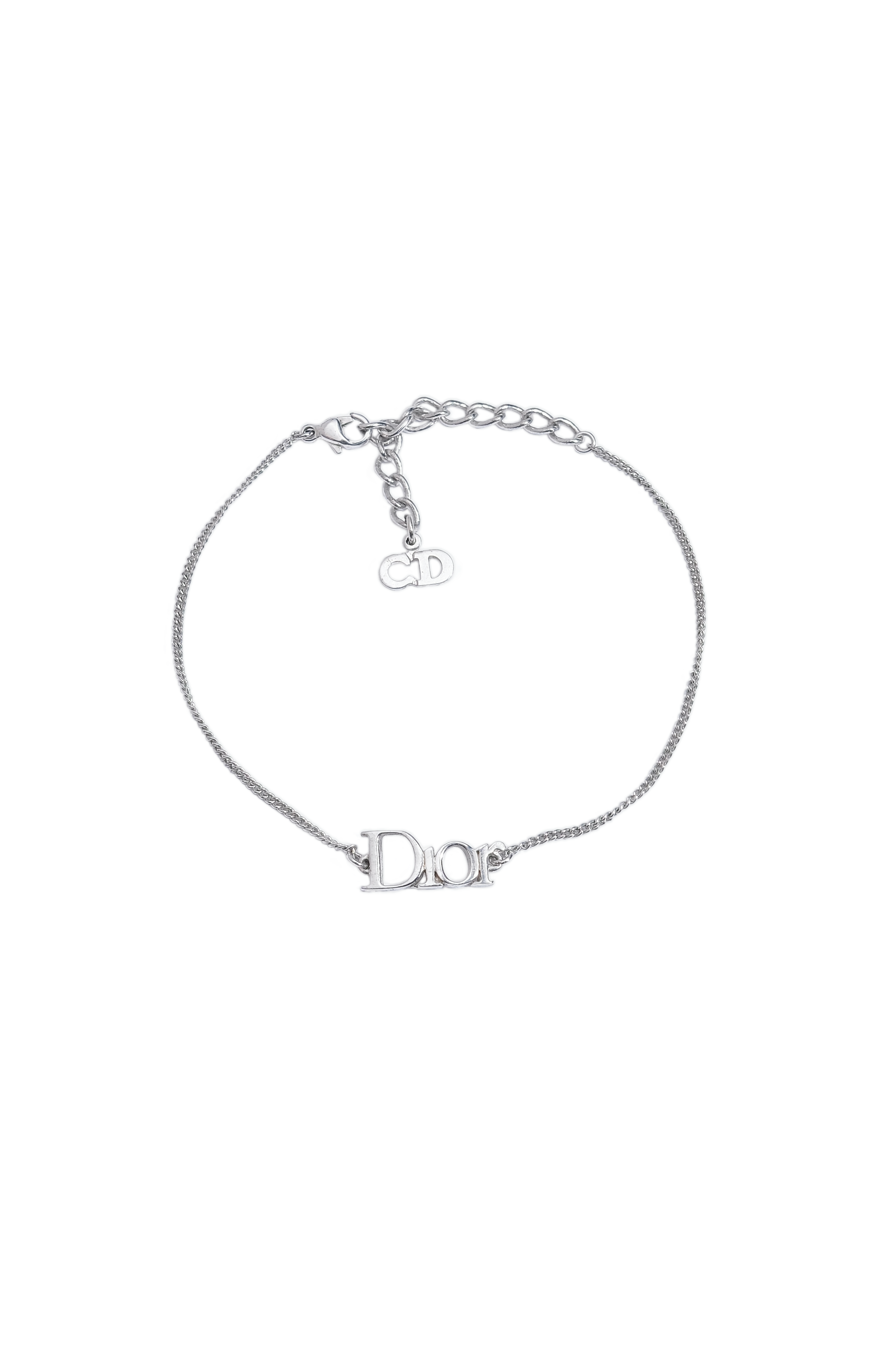 dior silver spellout logo letter bracelet wbg.png