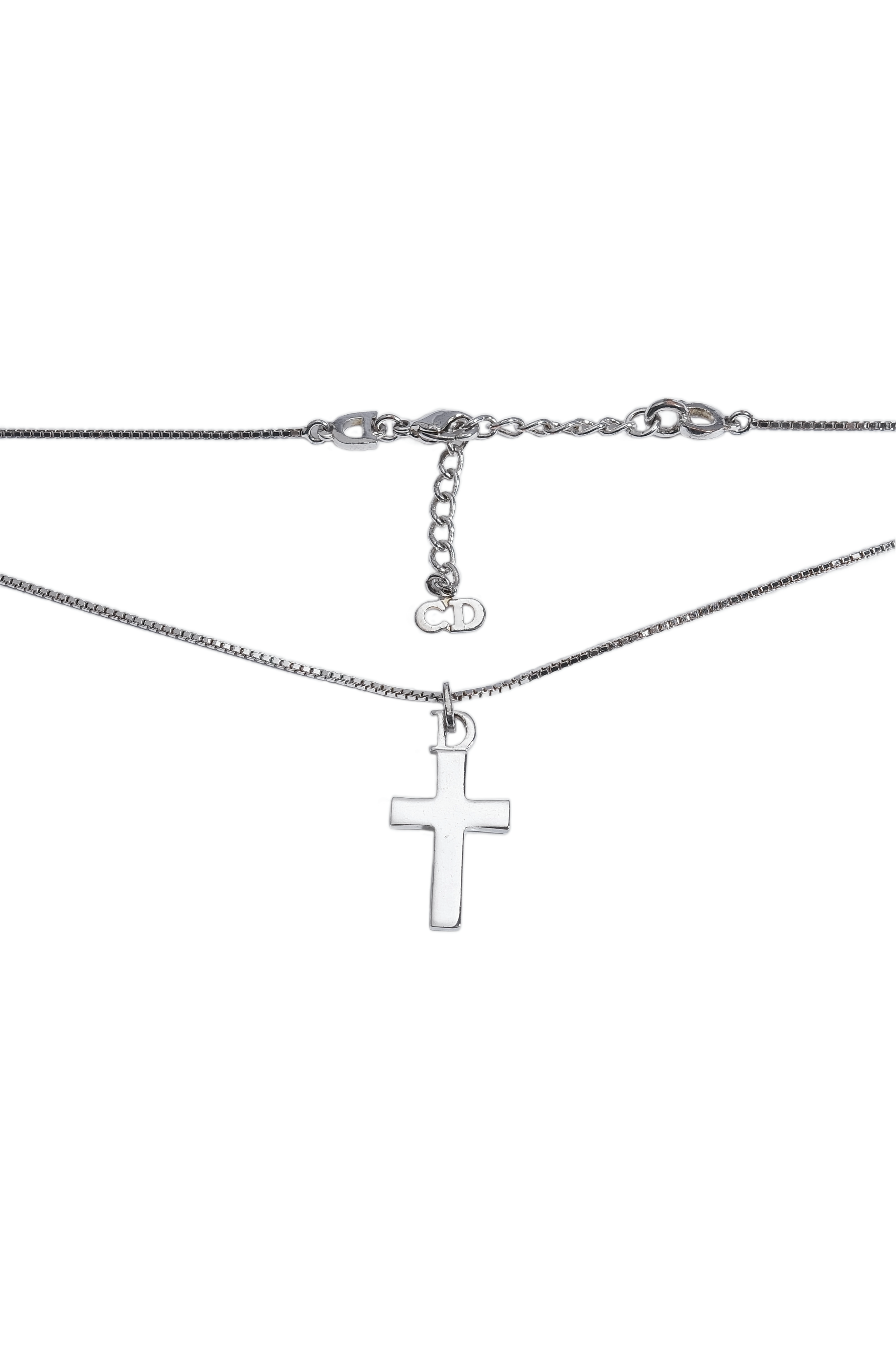 dior silver cross necklace wbg.png