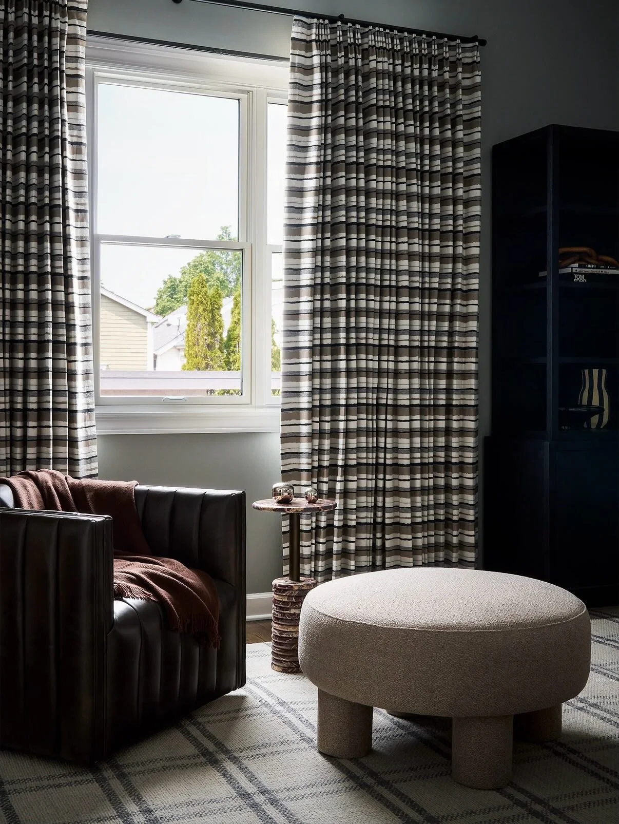 Rich leathers, warm wood finishes, and layered plaid patterns come together to create a teen boys&rsquo; room that balances classic style with youthful edge. A space designed to evolve with him, full of texture, character, and effortless cool. 

Phot