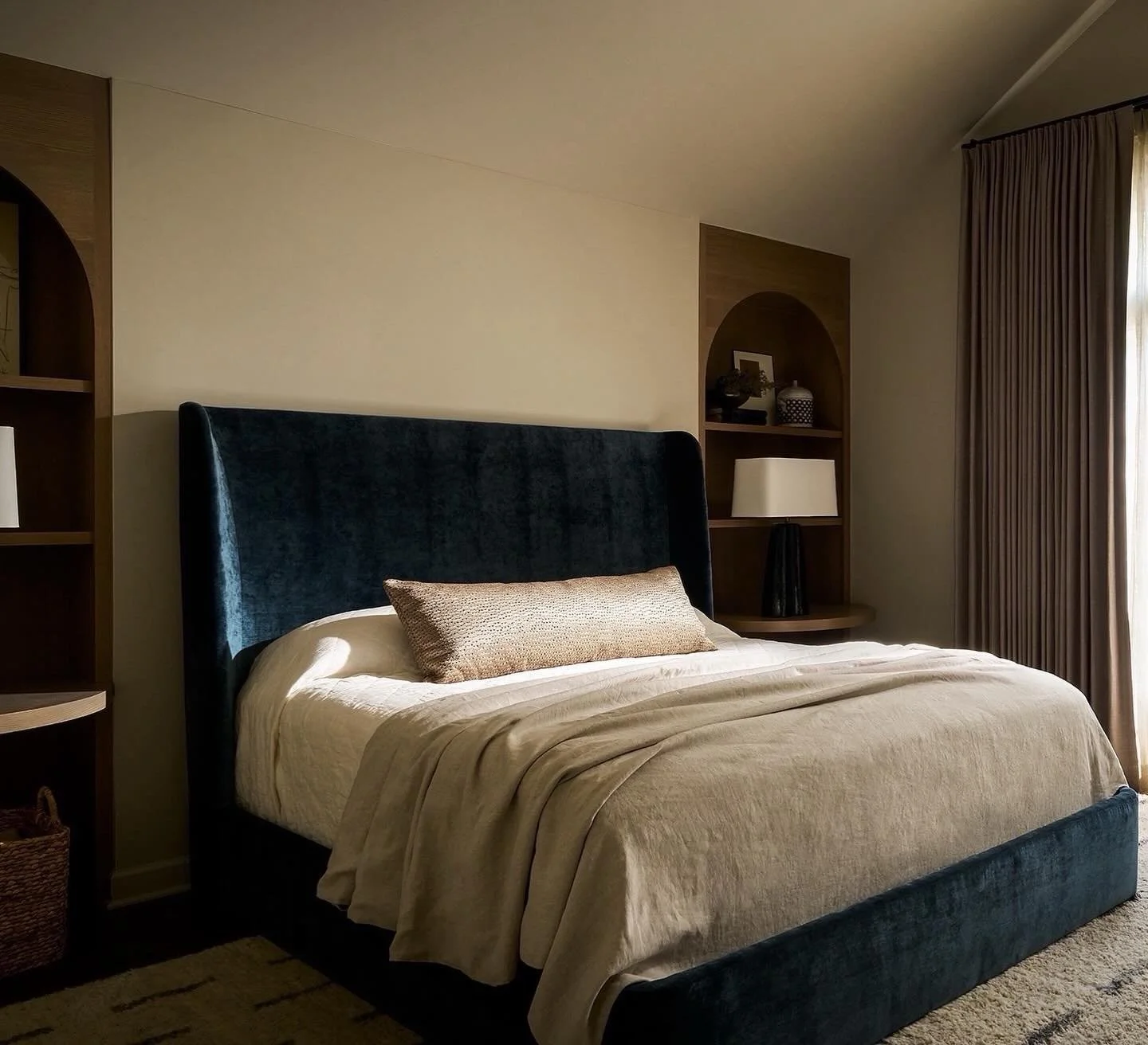 One of our favorite recent transformations 💙 The primary bedroom at our latest North Center project got a major upgrade. What were once two inset walls with no purpose are now beautiful custom arched built-ins, adding both storage and character to t