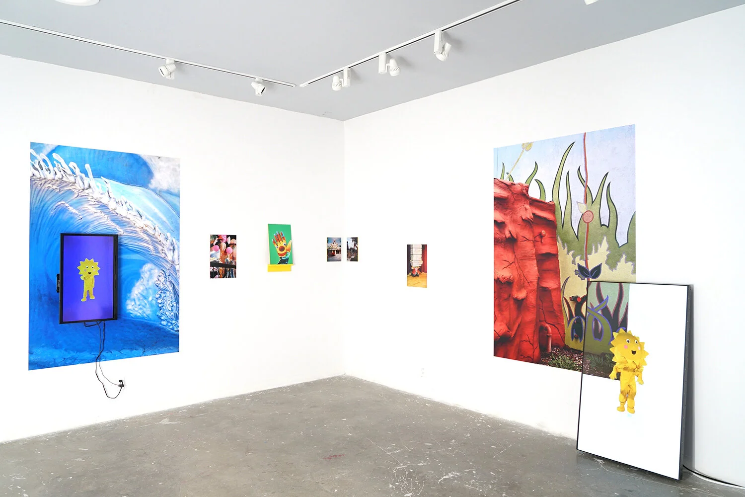 Documentation A Wish Stays With You exhibition, installation: monitor, vinyl photograph, photograph mounted on acrylic, wooden shelf, 2021