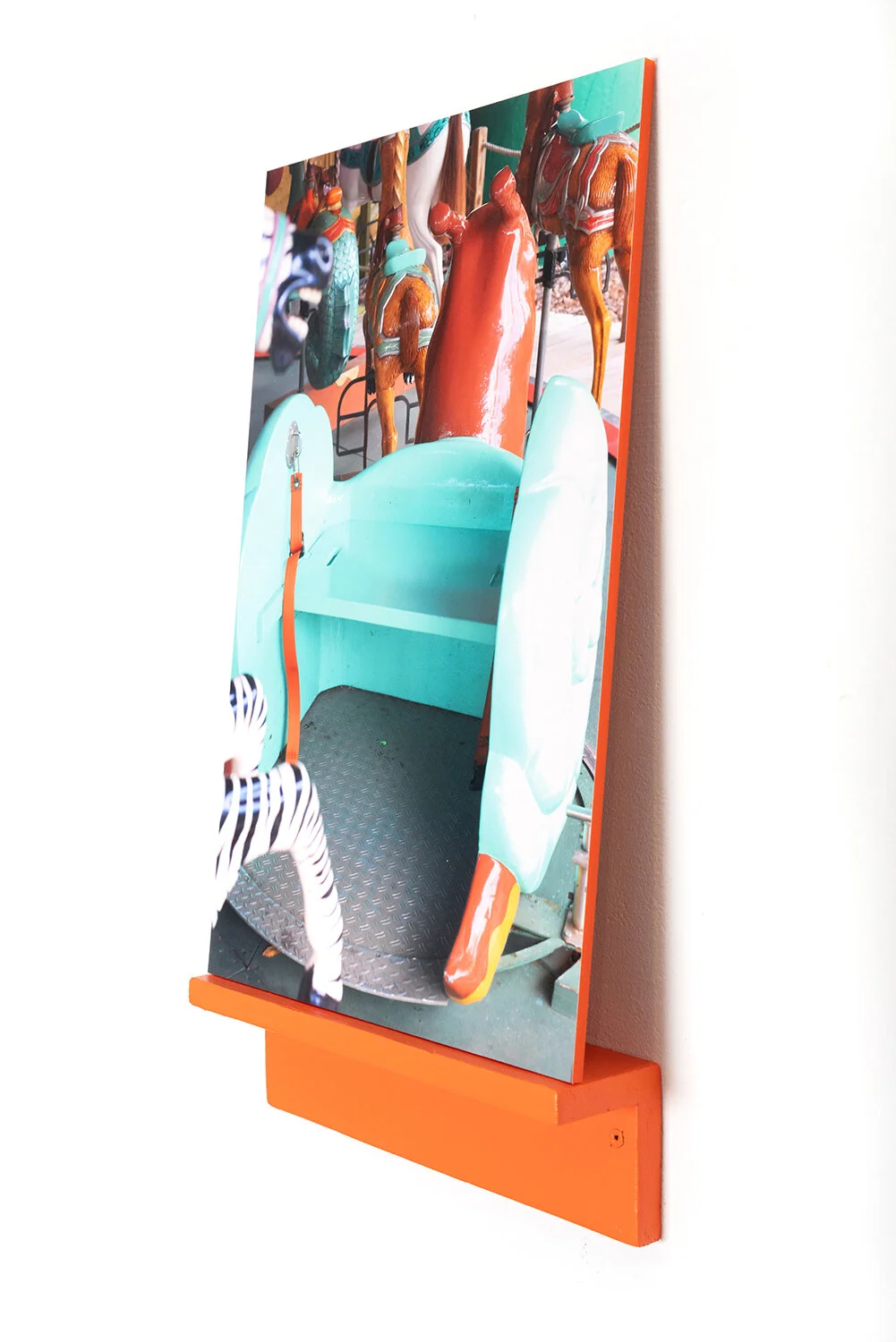 Detail A Wish Stays With You, photograph mounted on colored acrylic resting on painted shelf, 2021