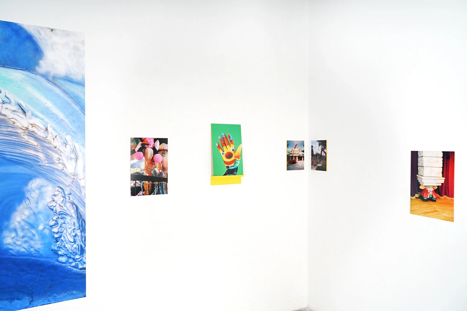 Documentation A Wish Stays With You exhibition, installation: vinyl photograph, photograph mounted on acrylic, wooden shelf, 2021