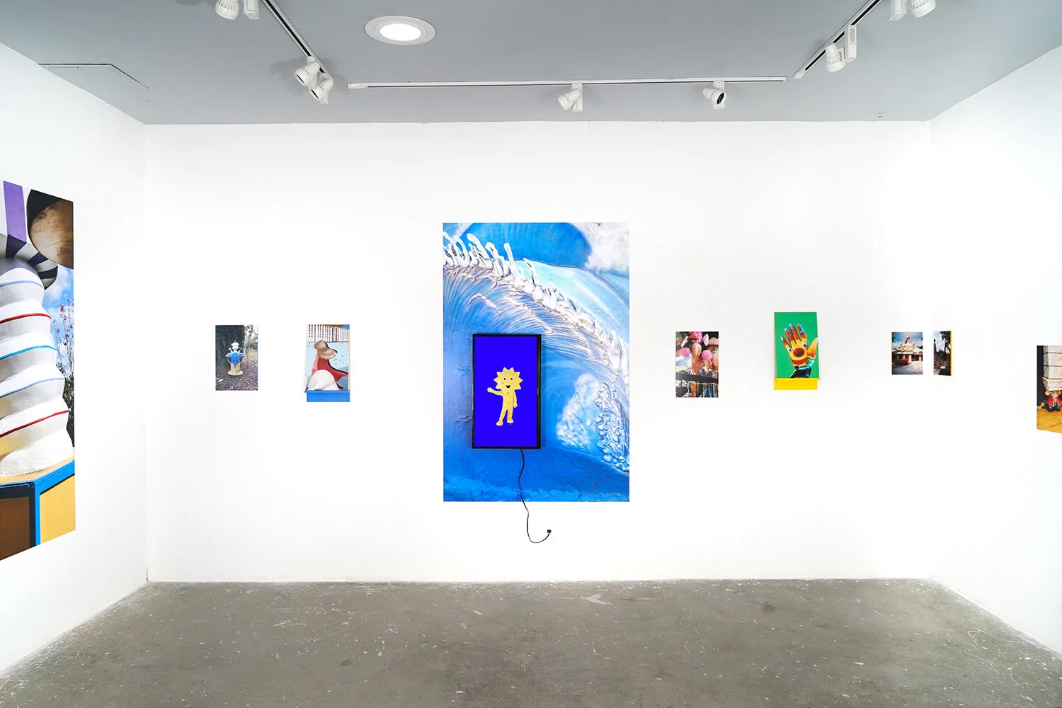 Documentation A Wish Stays With You exhibition, installation: monitor, vinyl photograph, photograph mounted on acrylic, wooden shelf, 2021