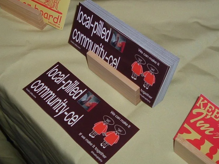 "Local-pilled community-cel" Bumper Sticker