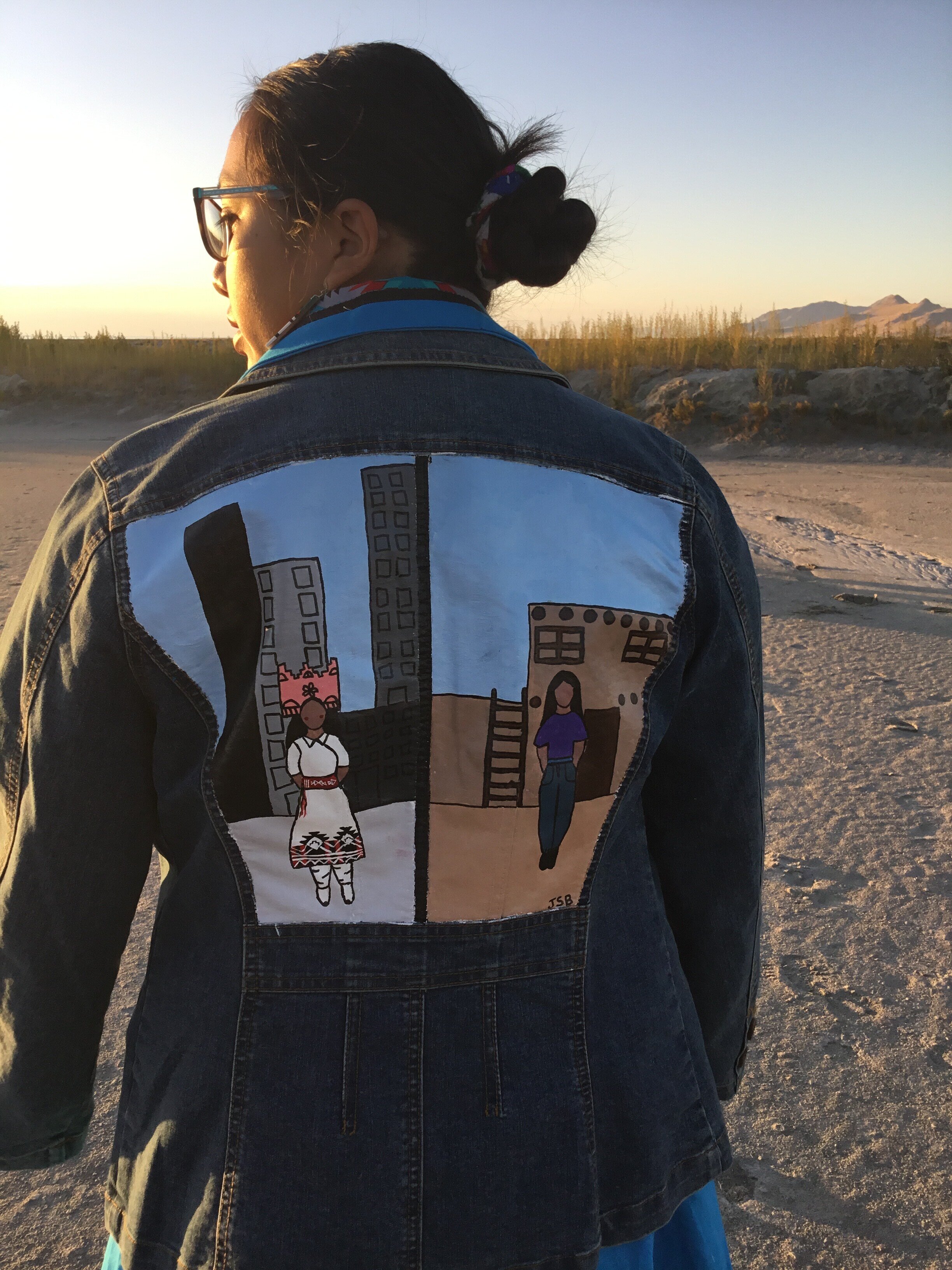 Hand painted denim jacket representing what it feels like as an Urban Native