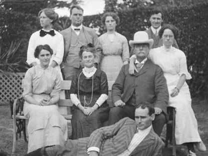 Henry Hill&nbsp;seated (right) beside his wife Emily, with their children.