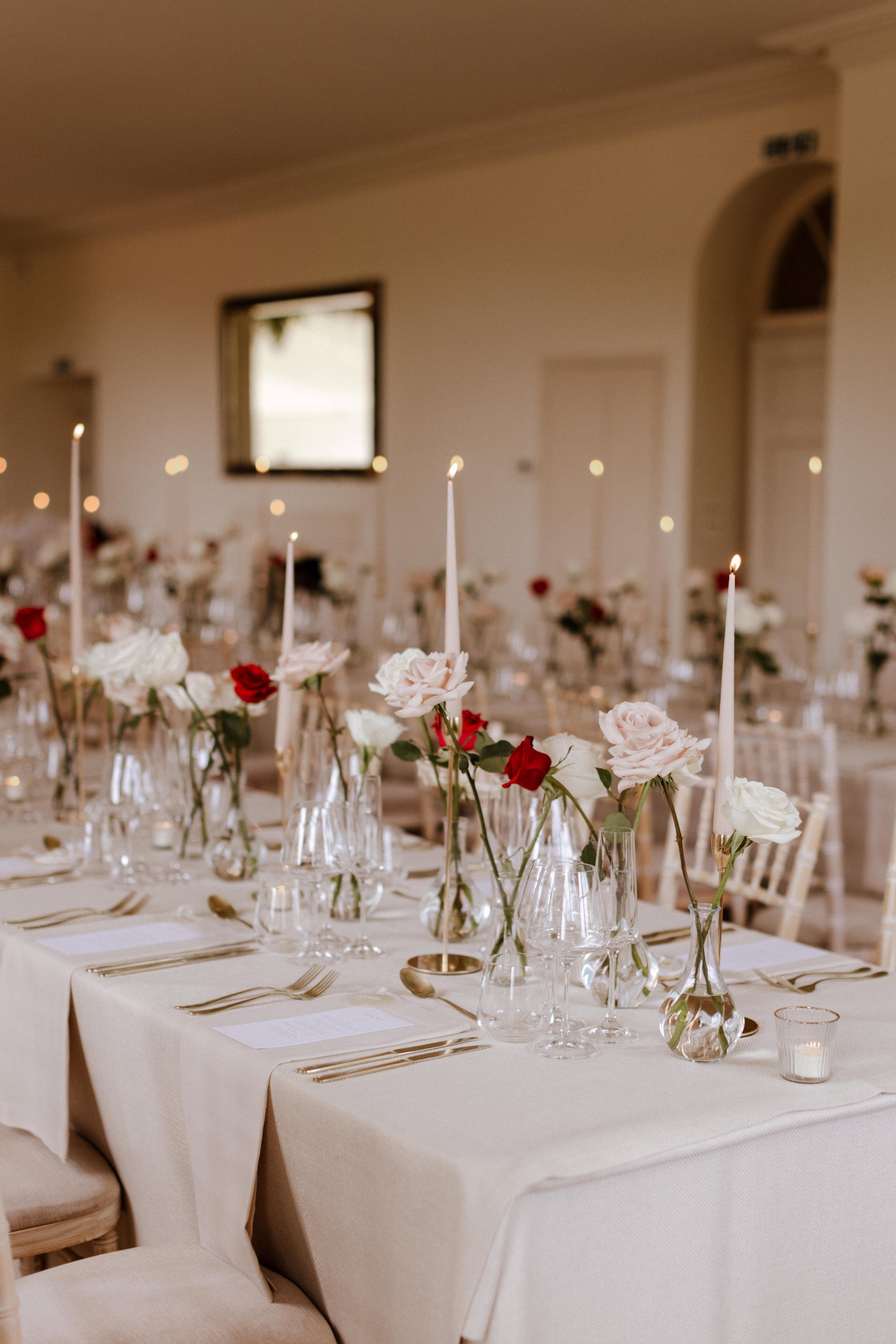 Modern neutral wedding design tables and flowers.jpg