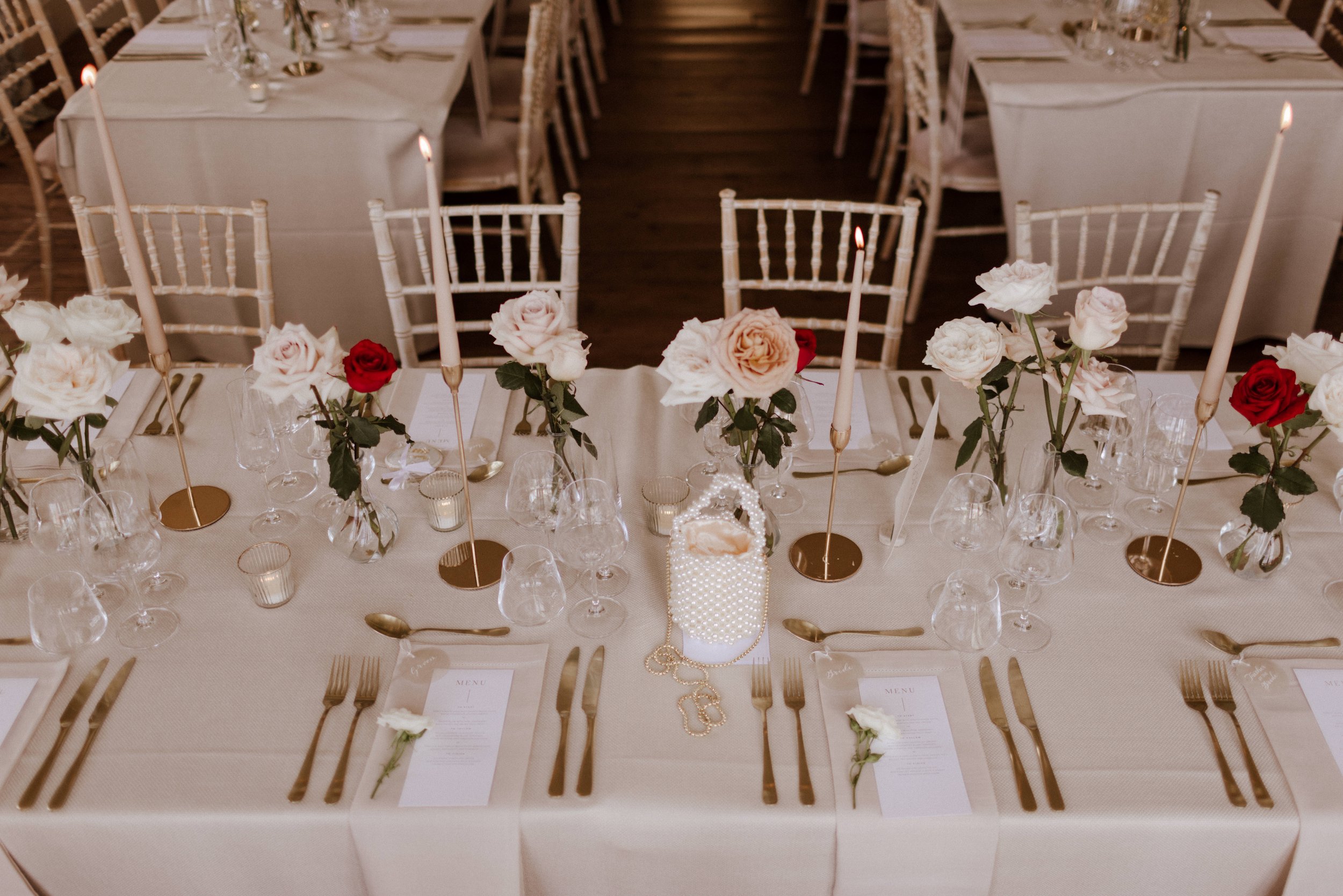 Minimalistic wedding flowers, long table, chic table settings.jpg