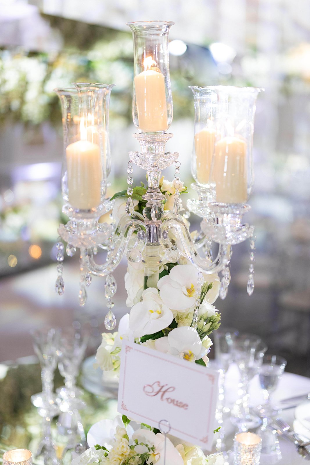Contemporary candelabra, luxury white wedding decor.jpg