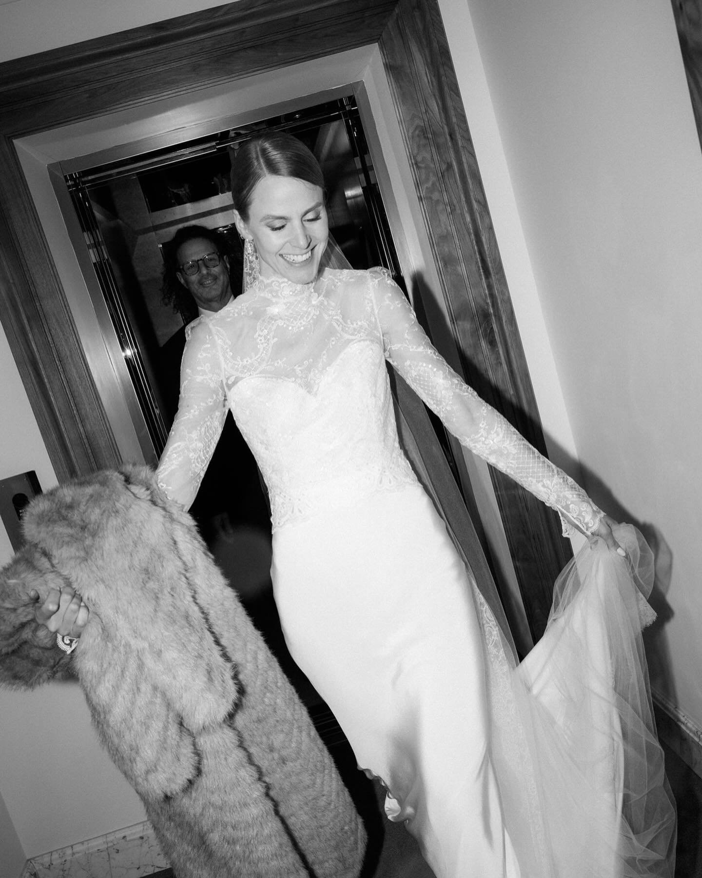 Gorgeous capture of our bride AM (and her groom R just behind!) returning to their suite at Claridge&rsquo;s to change into their evening attire after their beautiful and emotional ceremony at the Grosvenor Chapel (which, incidentally, was the settin