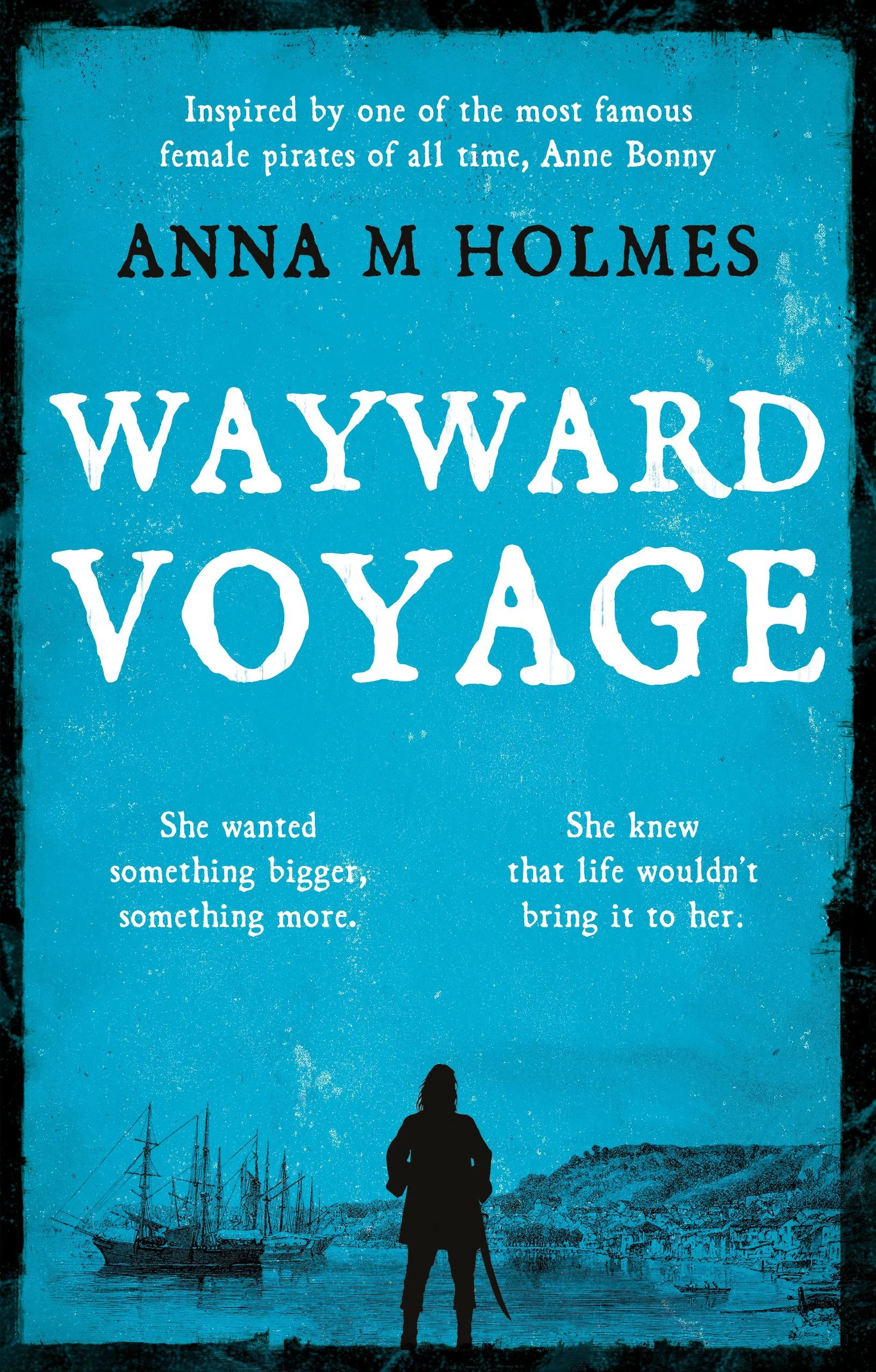 Book cover of 'Wayward Voyage' by Anna M Holmes, inspired by Anne Bonny, featuring a silhouette of a woman with long hair holding a sword, standing near the water with ships and a coastal landscape in the background.