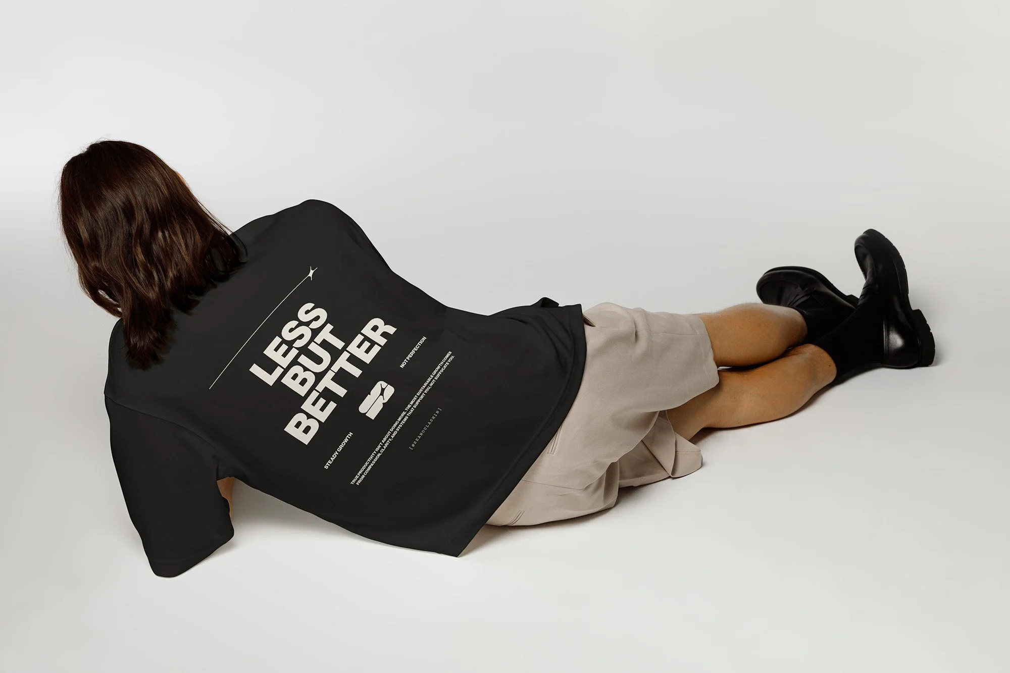 Branding applied to back of t-shirt mockup.