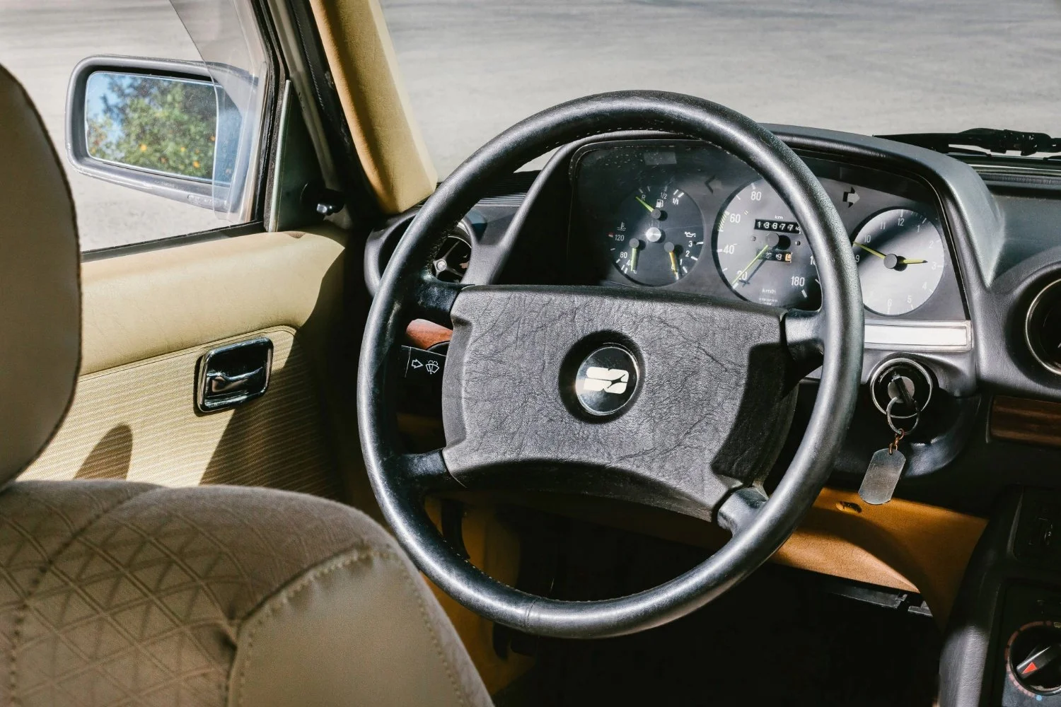 Brand mark applied to steering wheel mockup.