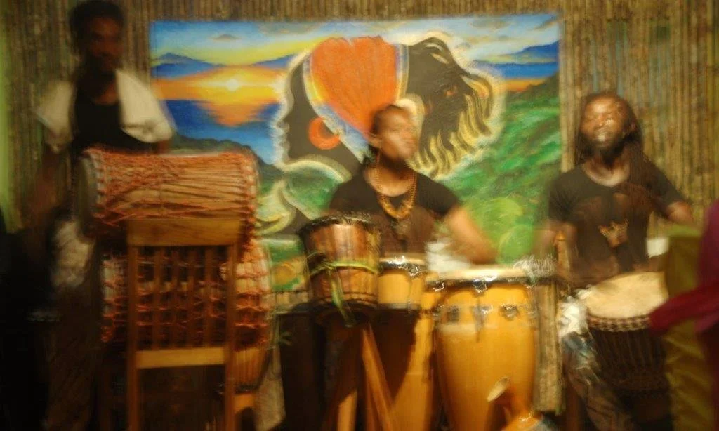 drummers on a colourful rasta background in Jamaica