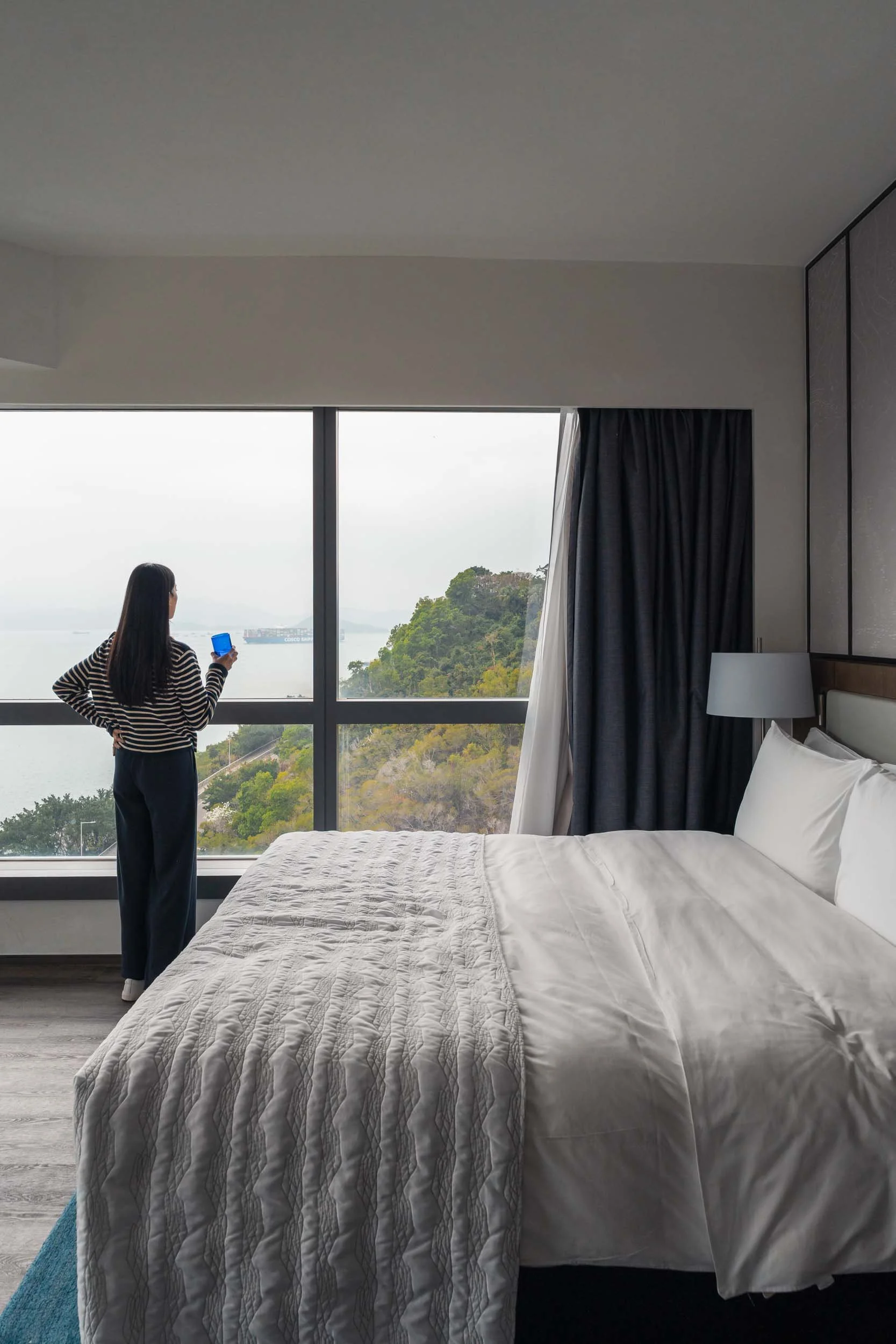 A hotel room in Hong Kong by Becoming Carmen