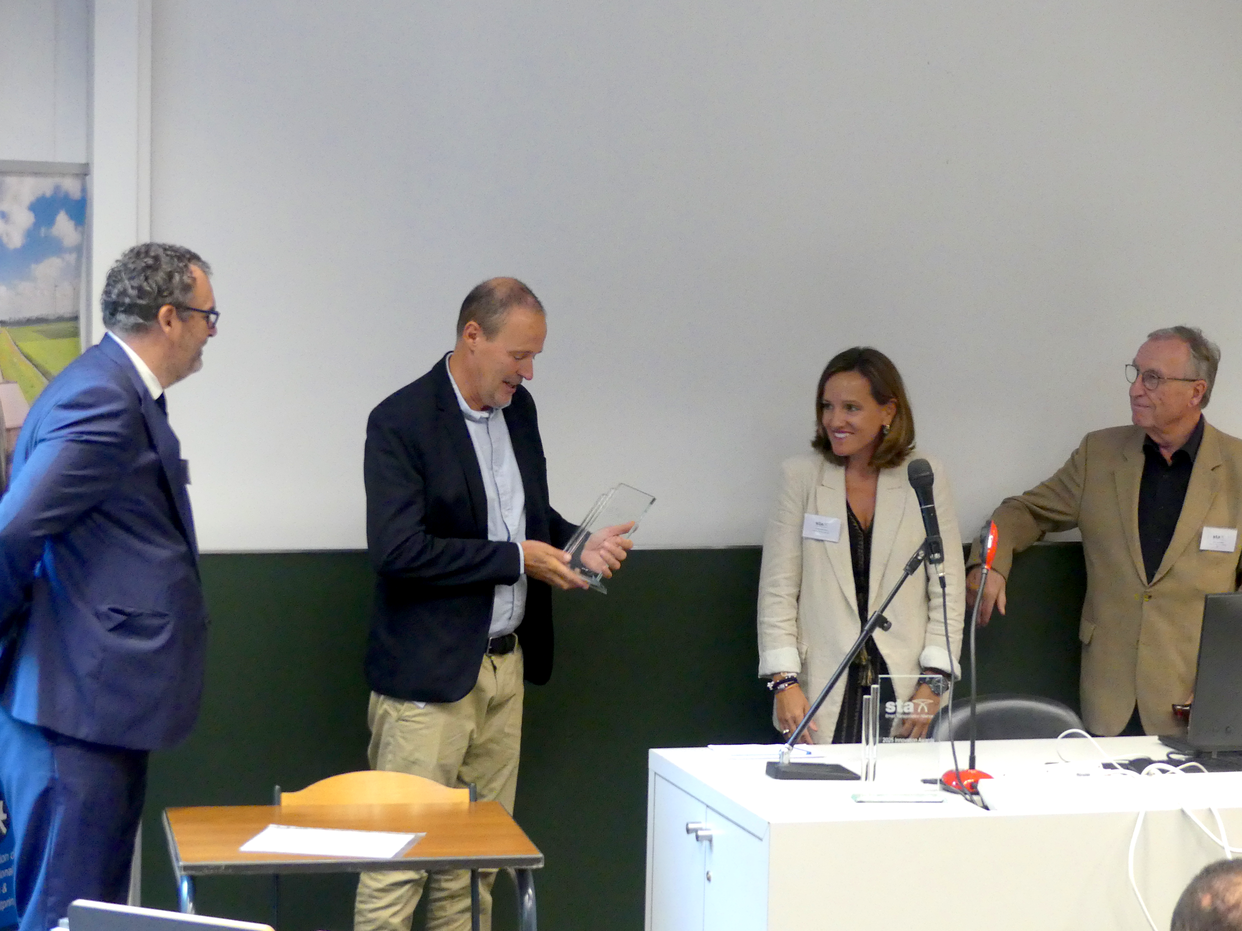 Mr Erwin Verstraelen receiving the Person of the Year Award