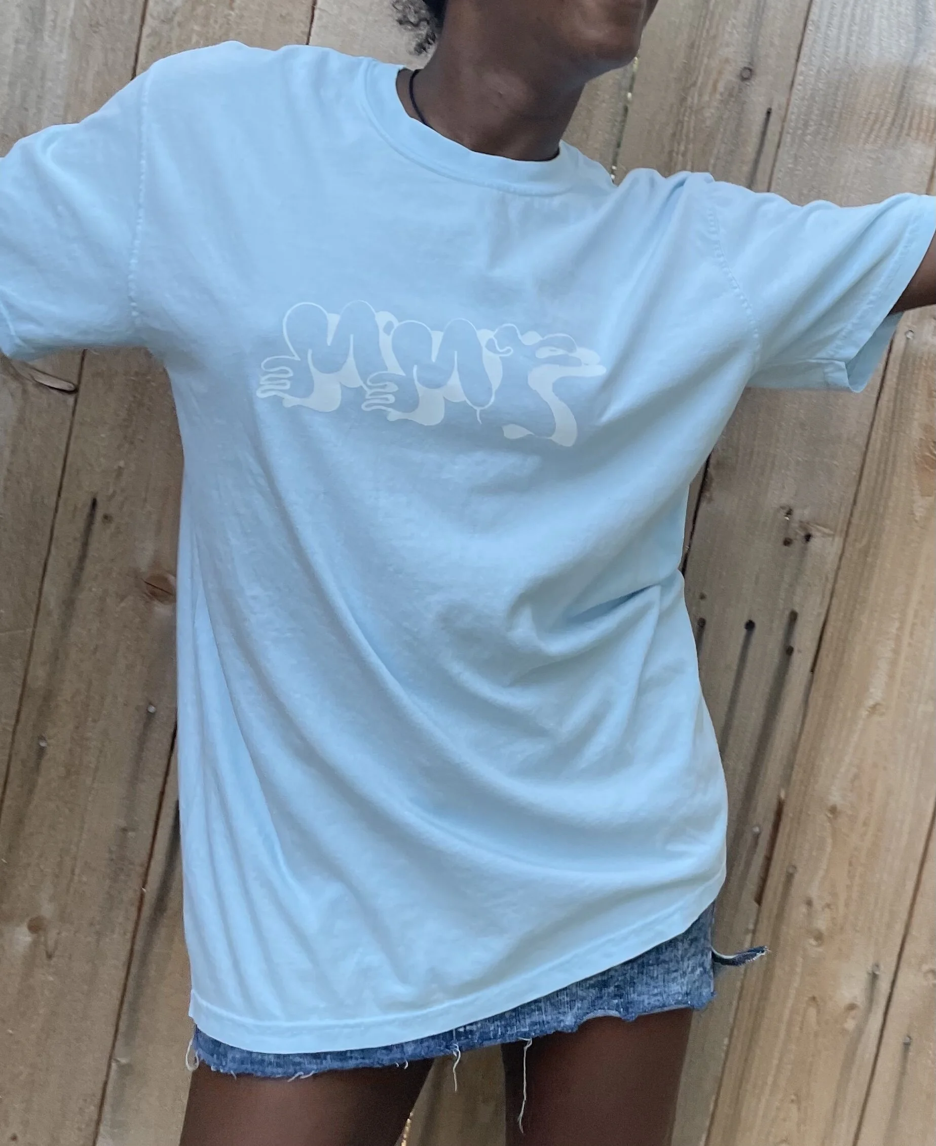 Avery-Jai in large light blue