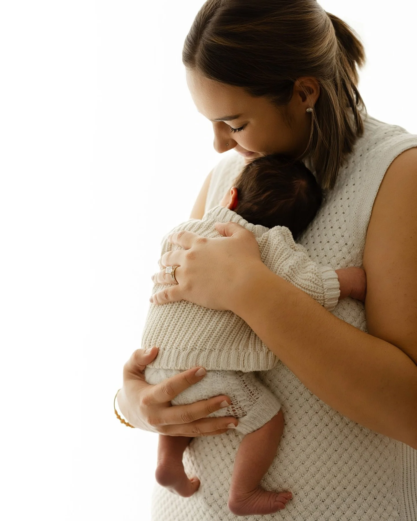 His little arm tucked in like he&rsquo;s hugging her right back 🥹