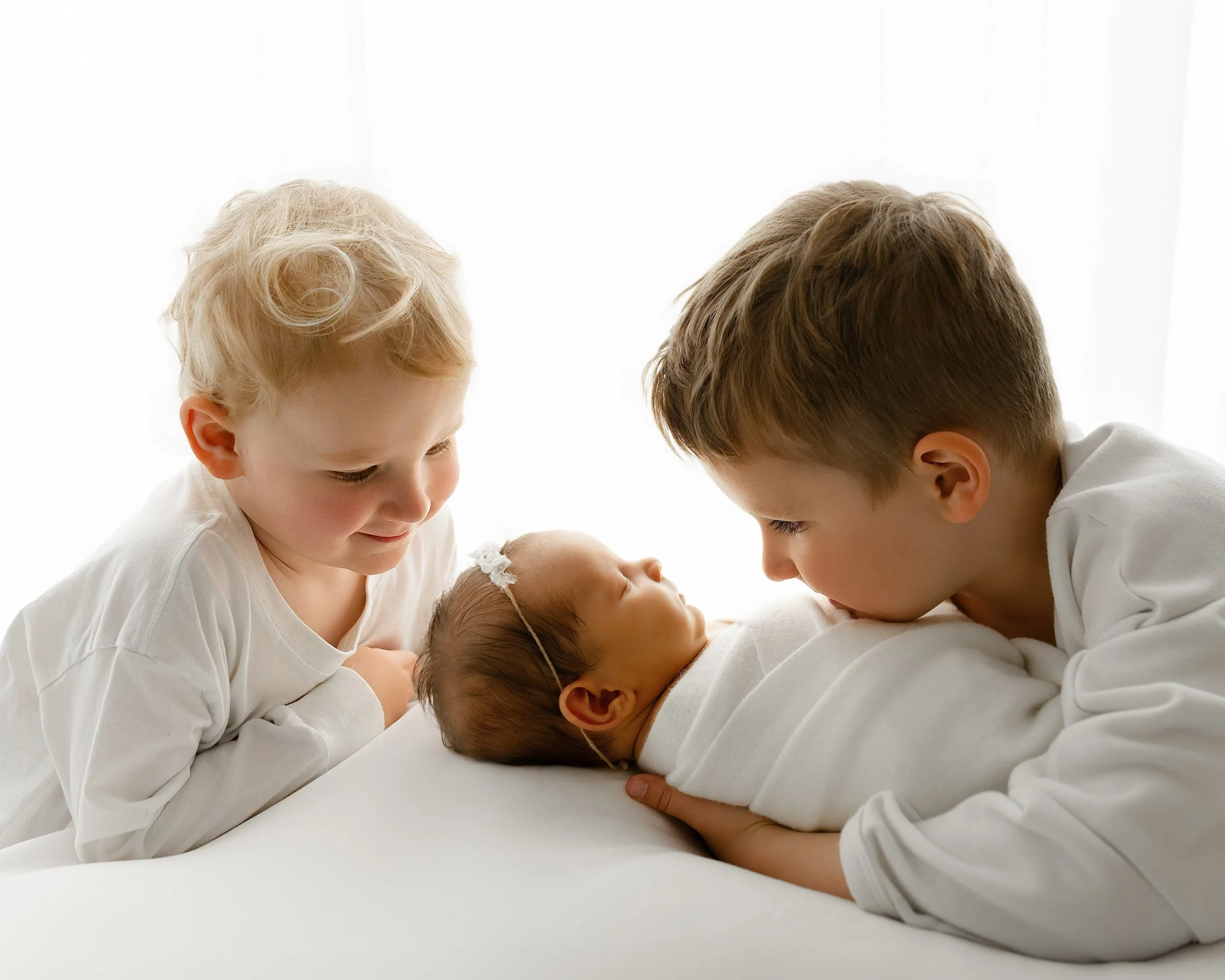 My heart cannot handle the way these proud brothers are looking at their new sister 🥹