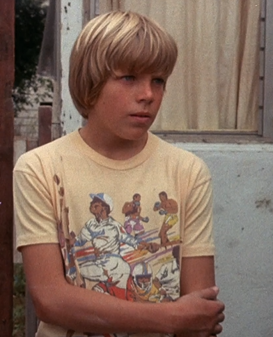 Dan McCann as "Kenny"