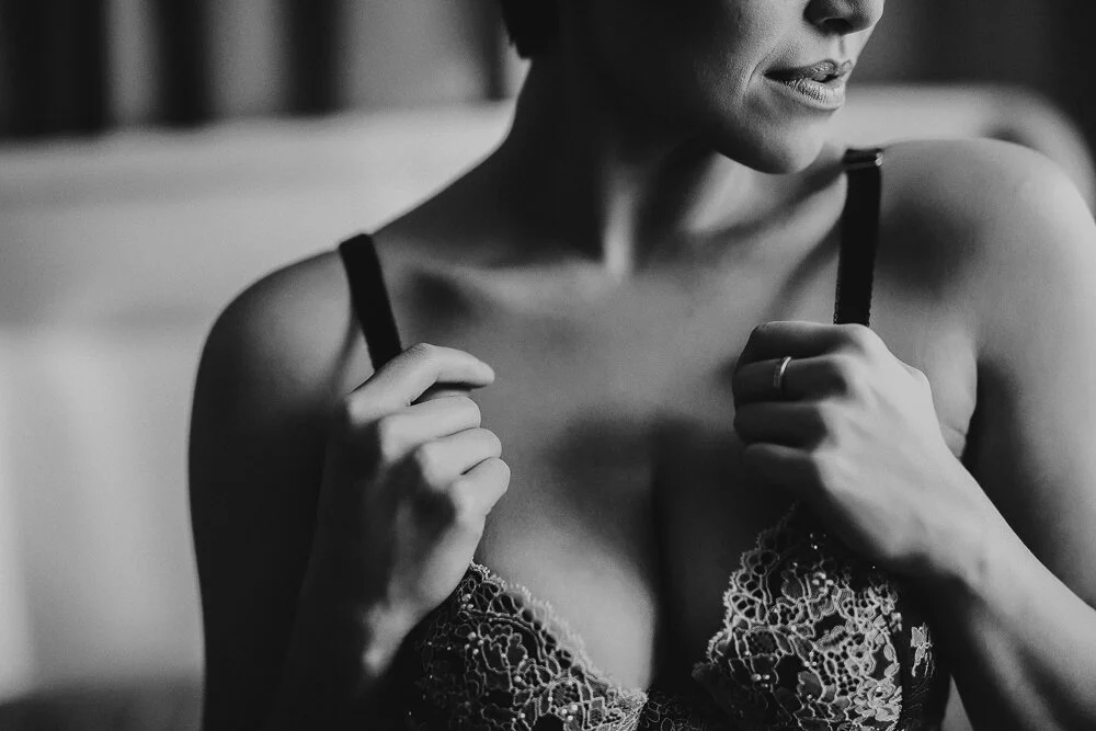 detail shot of woman in bra, black and white