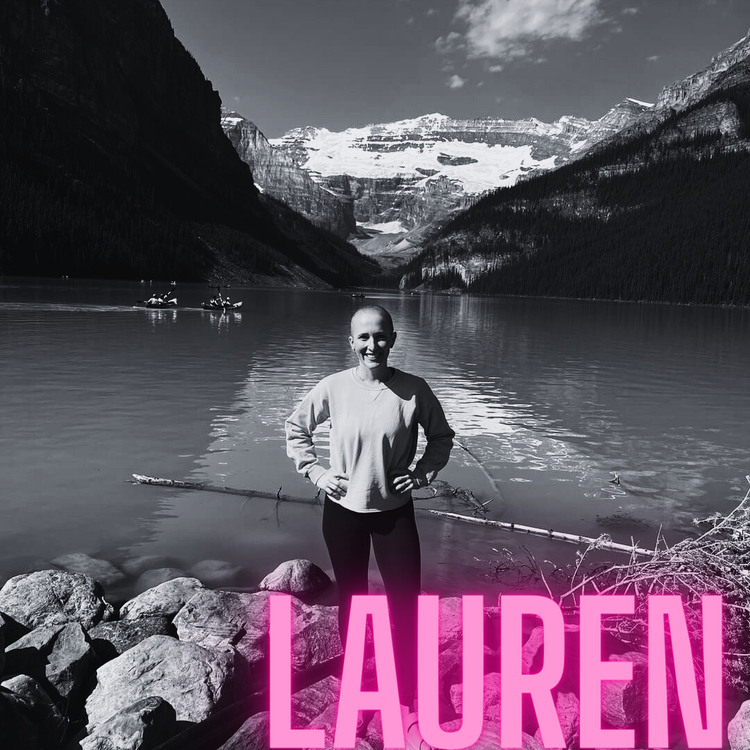 Lauren, a Chemo Club member, by a mountain lake