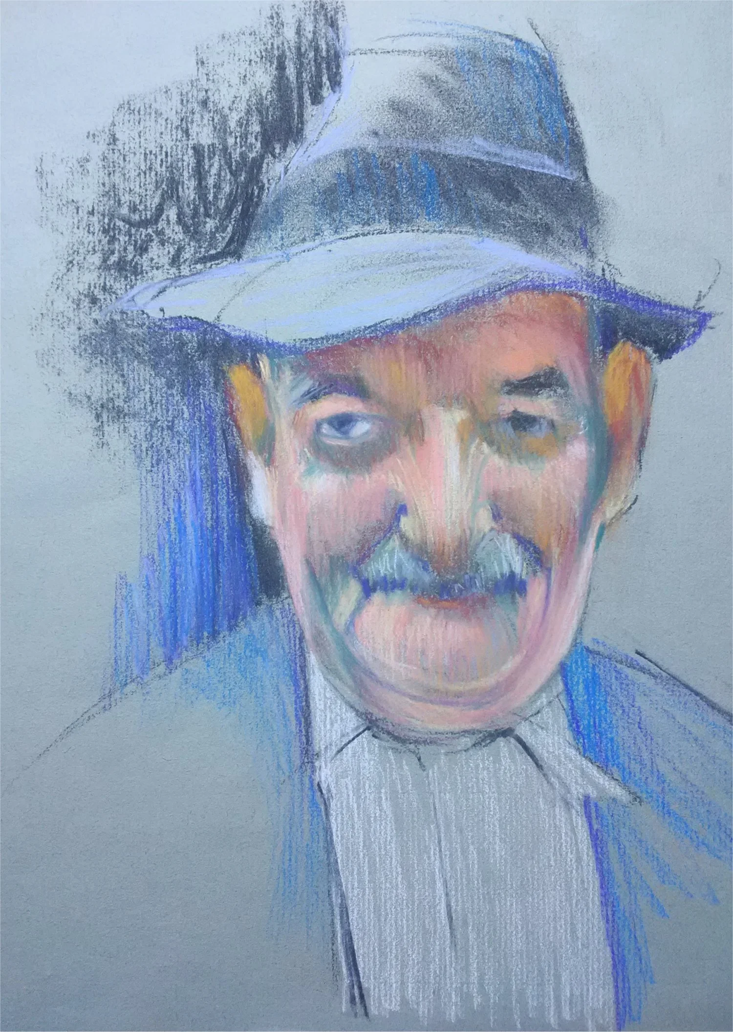 7. Man in a Hat, pastel pencils on paper, 9in. x 12 in. PEOPLE.jpg