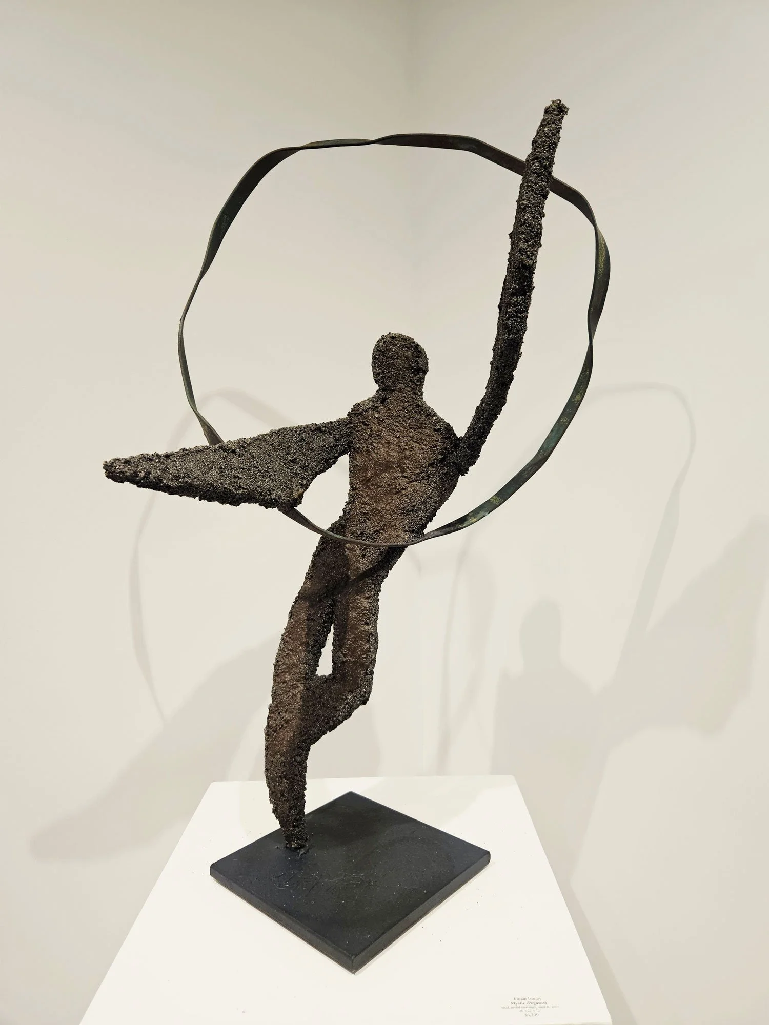  Orb (Icarus Series)  30” x 20” x 10” (iron base 8" x 8") 
Steel with oxidized metal shavings.