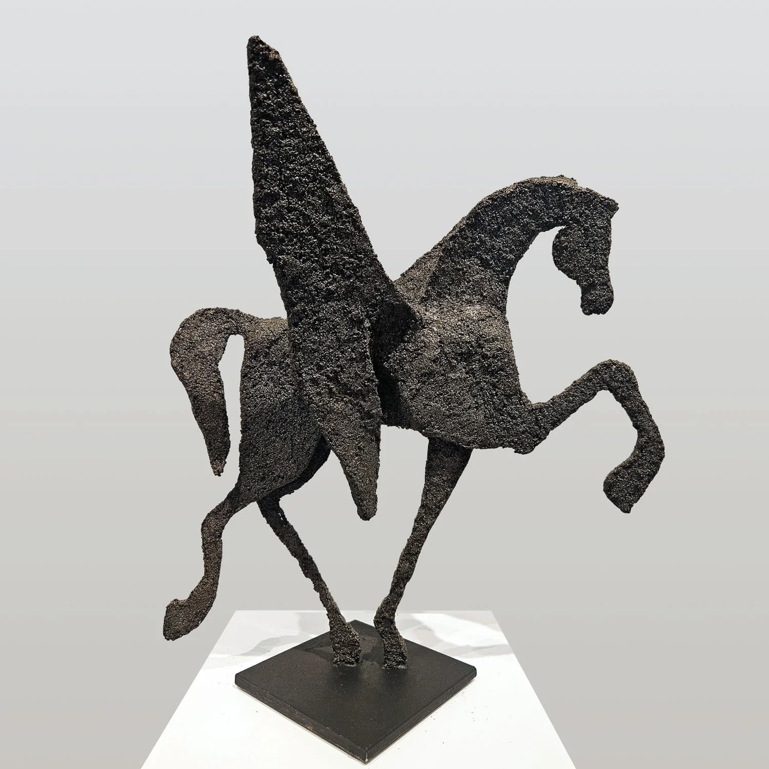  Pegasus IV  26" x 24" x 8" ( iron base 8" x 8") Resin, sand, and gold leaf.