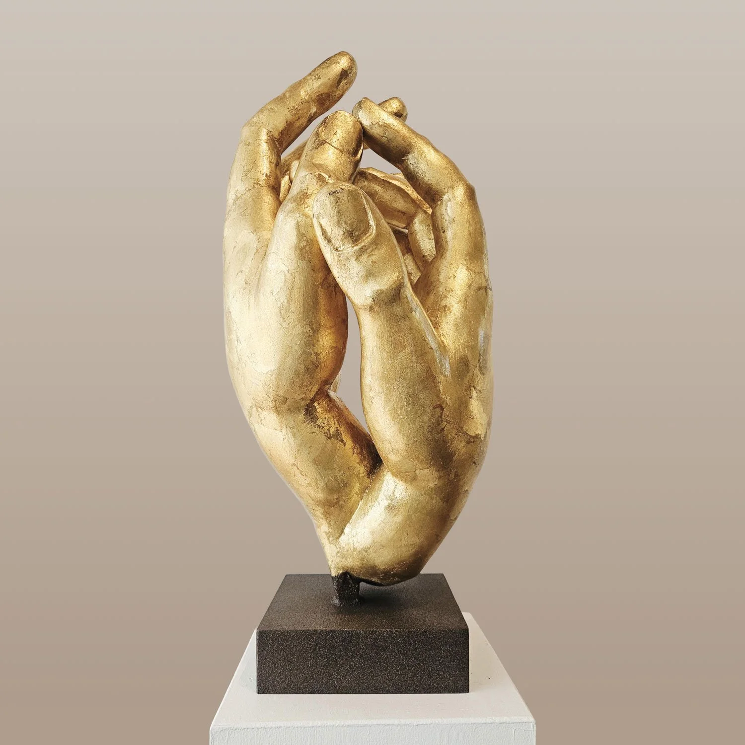  Golden Hands  40" x 20" x 20" (base 12¾" x 4") Resin, sand, and gold leaf.